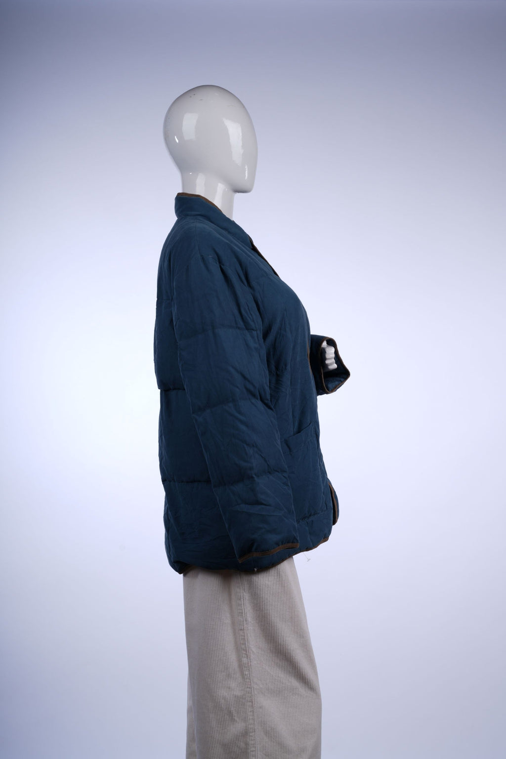 Versatile insulated Balmain puffer with signature branding, ideal for everyday winter styling.