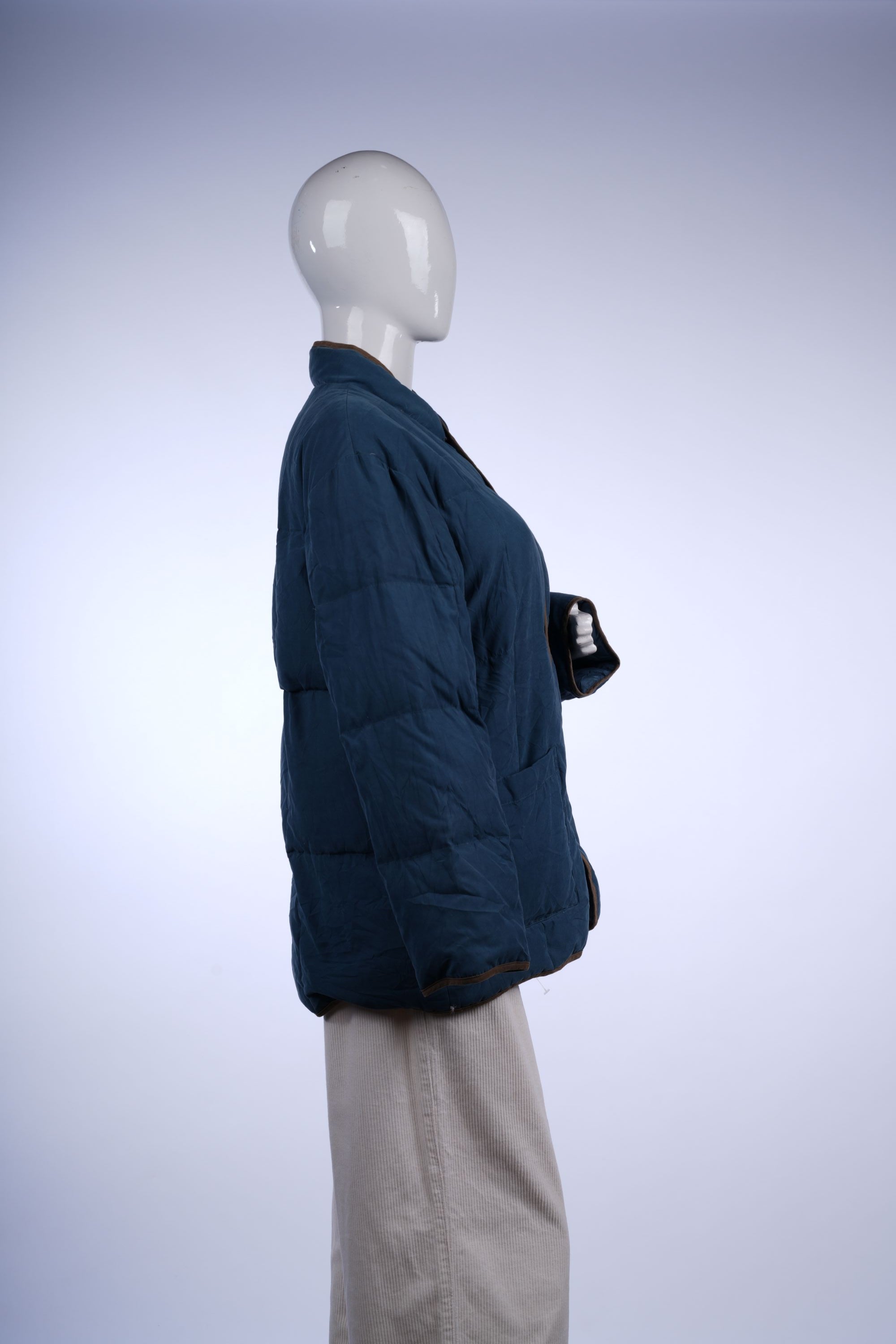 Versatile insulated Balmain puffer with signature branding, ideal for everyday winter styling.