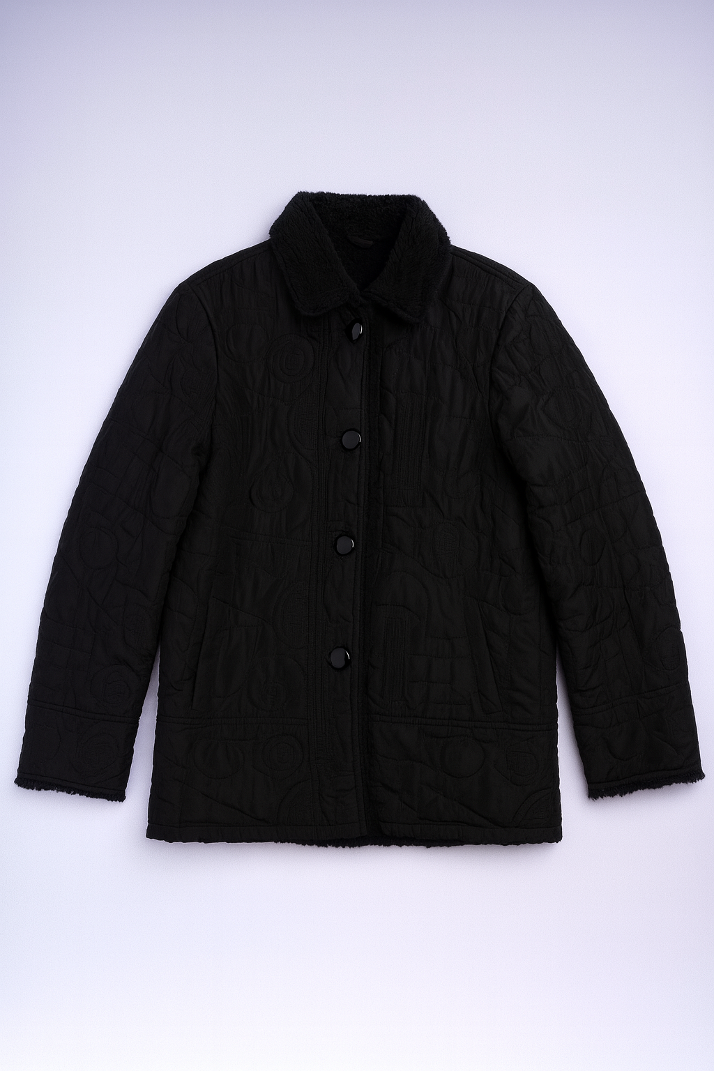 Black quilted jacket with button-front closure, front pockets, and plush faux fur collar for warmth and style.