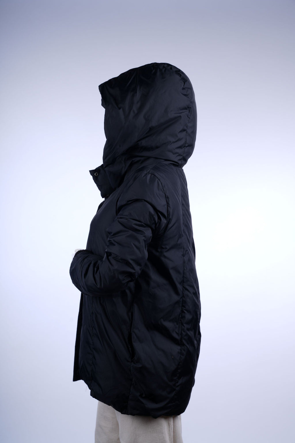 Warm long quilted coat with full-length zipper and high collar, designed for maximum coverage in cold weather.