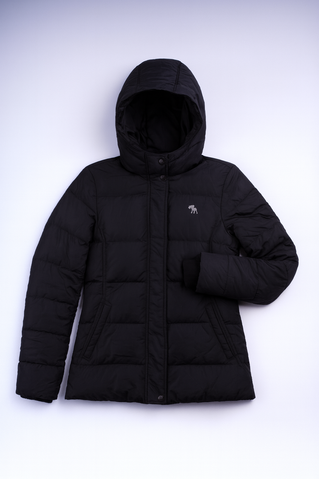 Dark grey and black quilted puffer jacket with stand-up collar and full-zip closure, insulated for cold-weather wear.