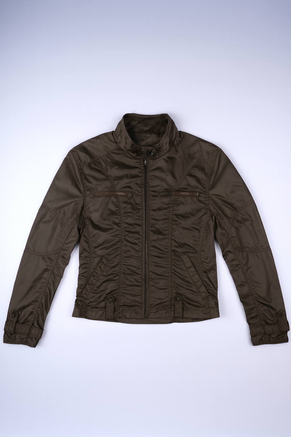 Casual ruched jacket with full-zip front, multiple pockets, and faux-fur lined stand-up collar, ideal for transitional weather.