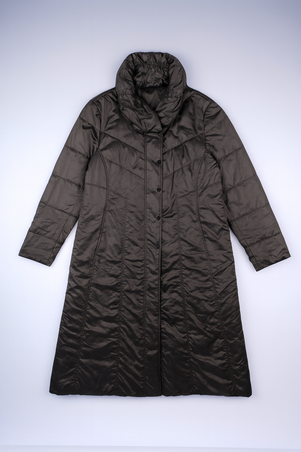 Longline grey puffer coat with quilted design, stand-up collar, and full zip closure, providing insulated warmth for winter.