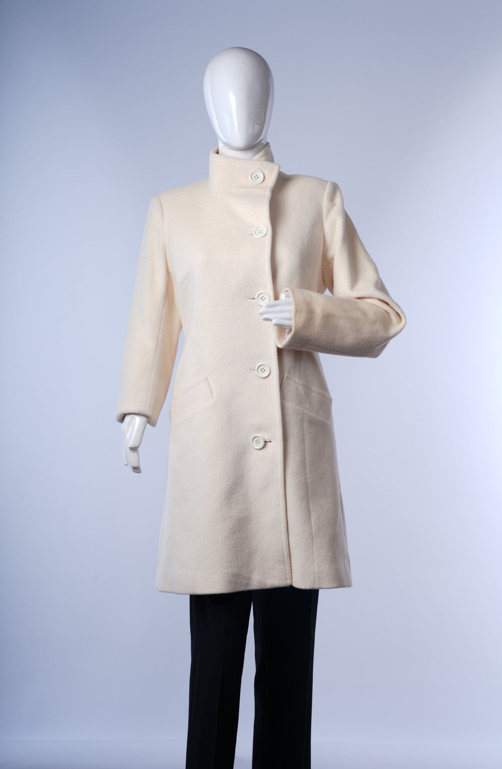 Elegant ivory coat for women perfect for formal and semi-formal looks