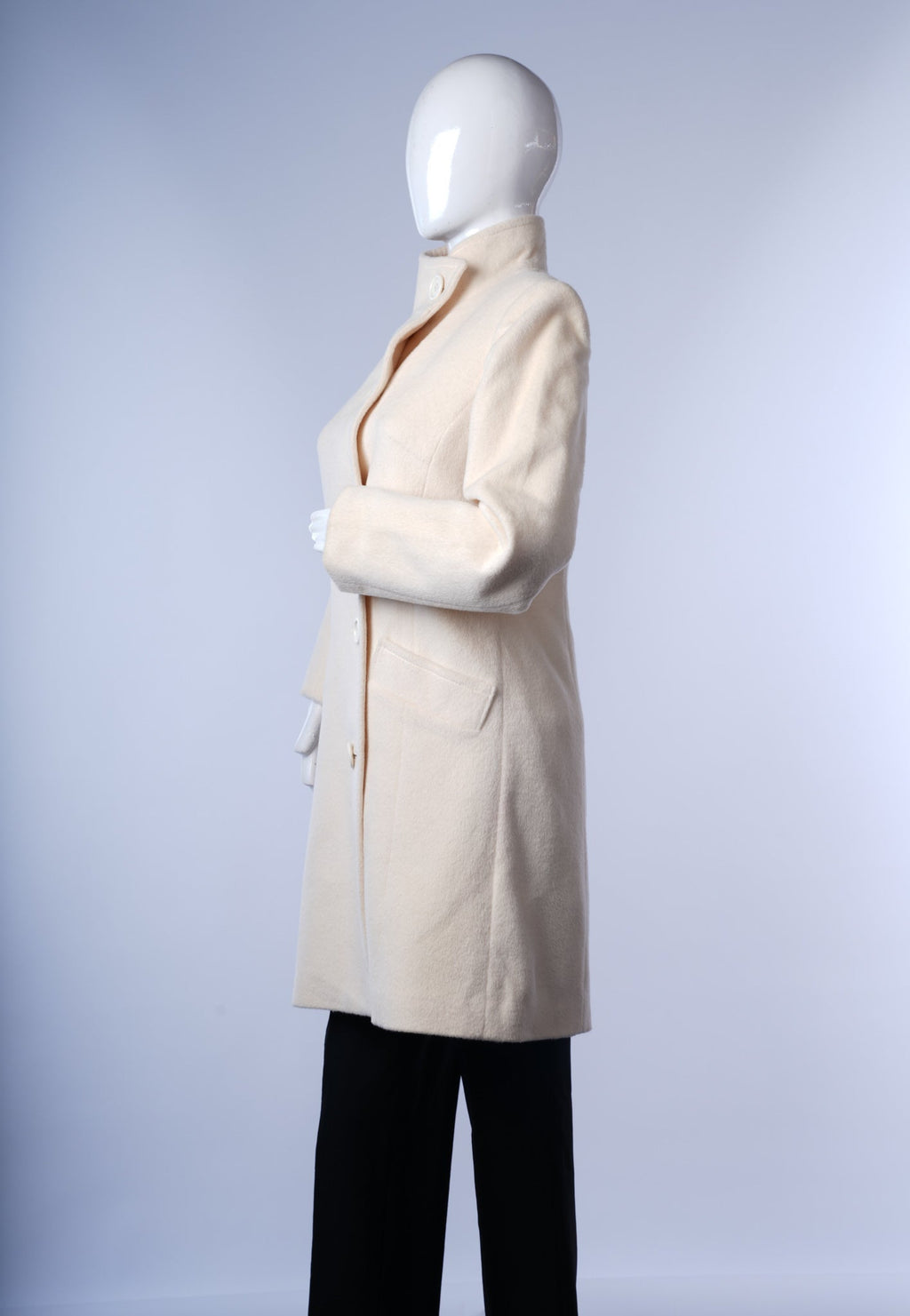 Vintage-inspired ivory long coat for women with classic design