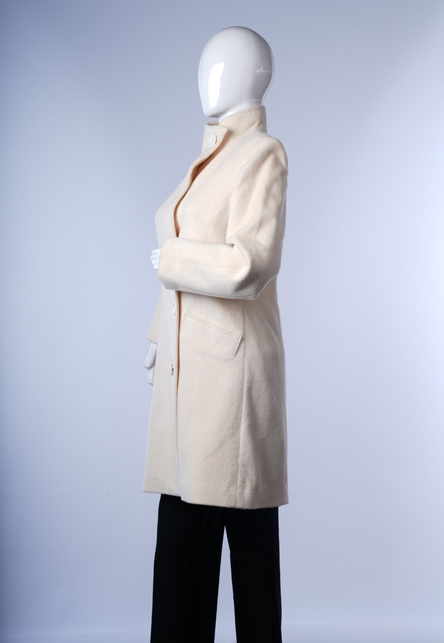 Vintage-inspired ivory long coat for women with classic design