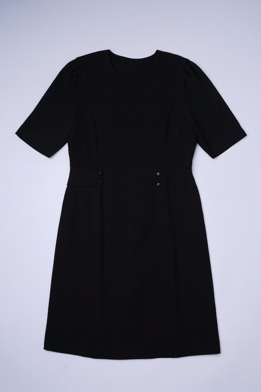 Elegant black midi dress with long sleeves and a front slit, perfect for work or evening occasions.