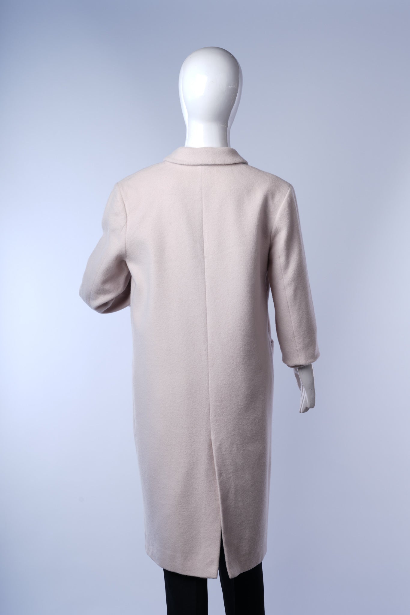 Classic women's beige overcoat with notched lapel and tailored silhouette