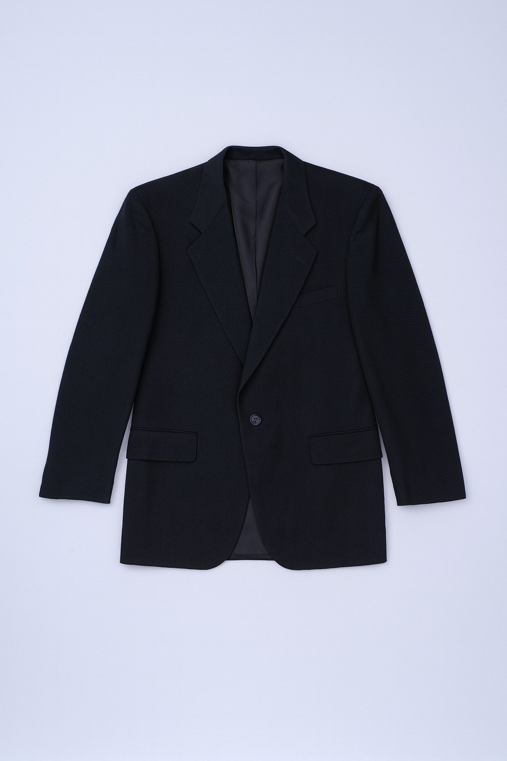 Single-breasted black suit blazer with notched lapels and flap pockets for men.