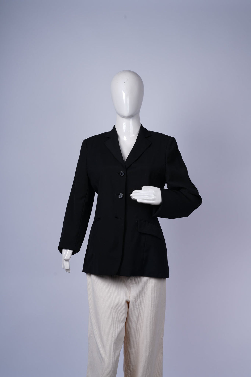 women's black blazer ideal for work, events, or semi-formal occasions.