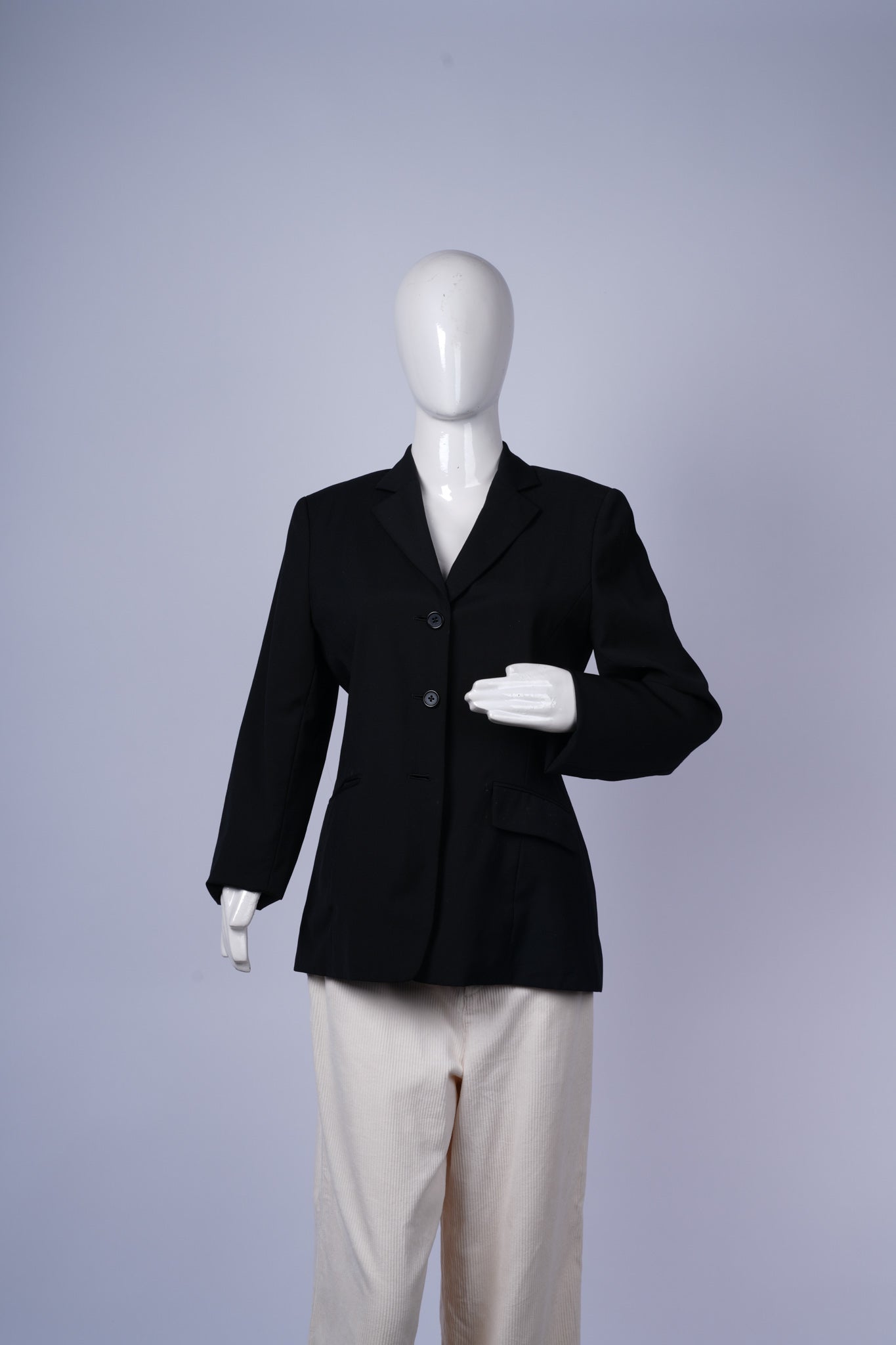 women's black blazer ideal for work, events, or semi-formal occasions.