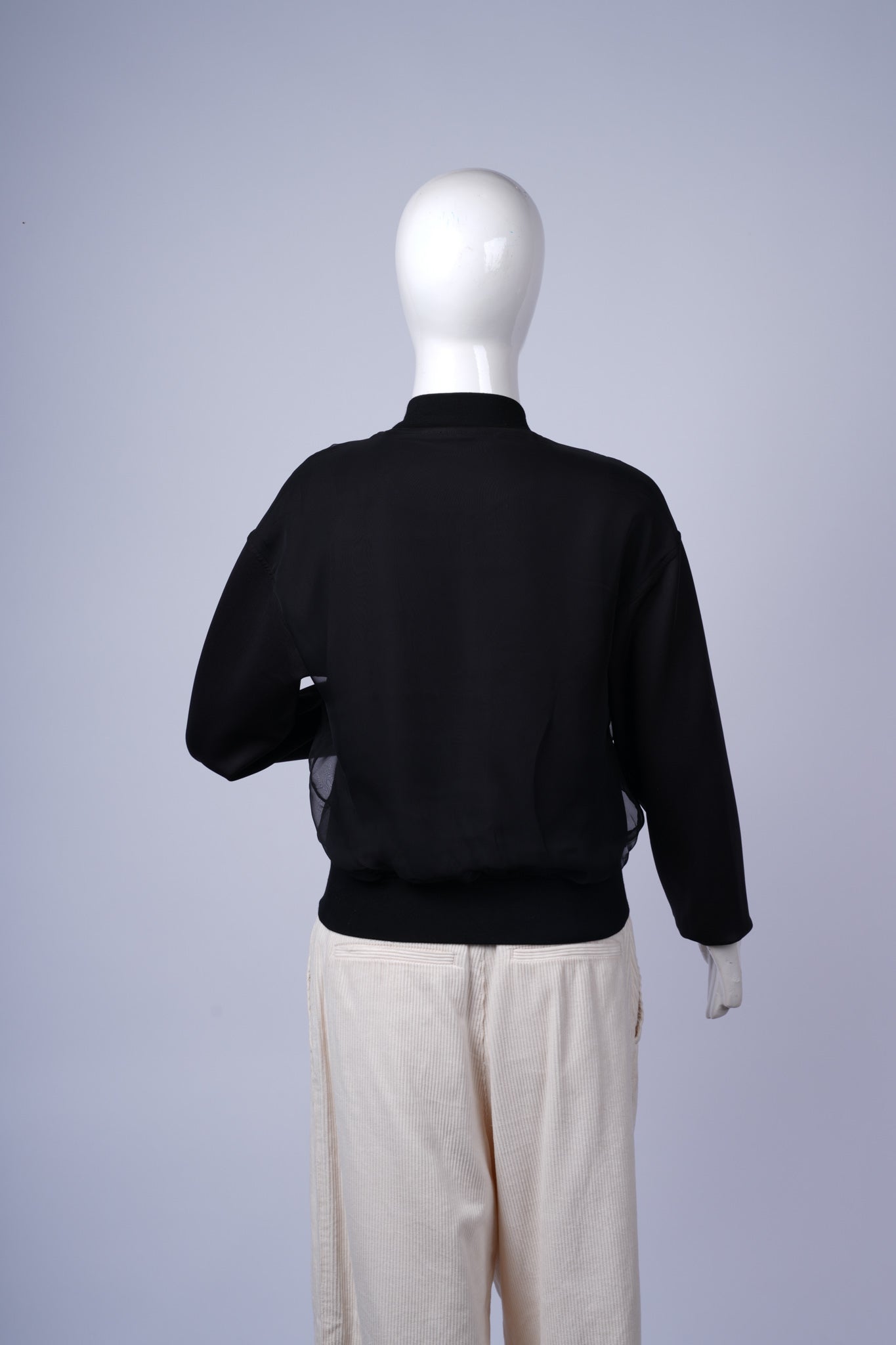 Stylish black bomber jacket perfect for smart-casual or everyday outfits.