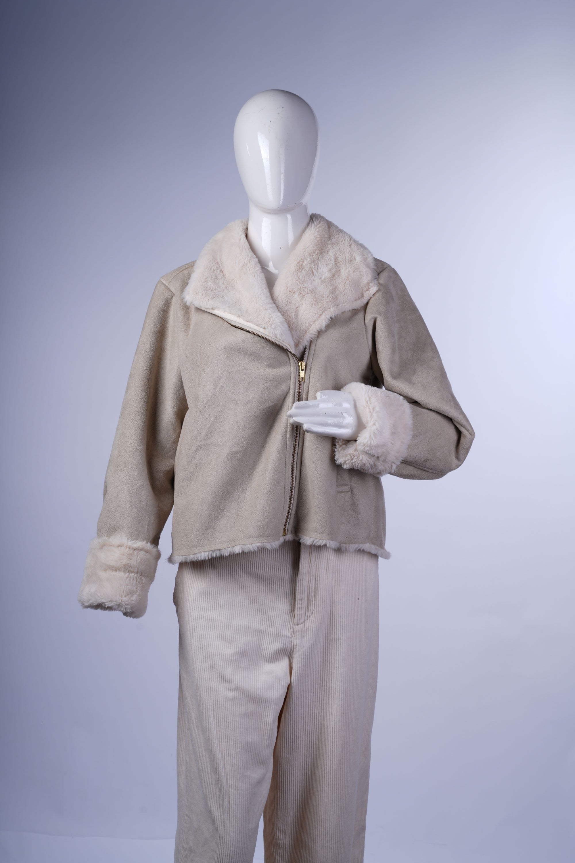 Vintage-inspired cream aviator-style jacket featuring cozy faux fur interior, wide collar, and subtle zip pockets.