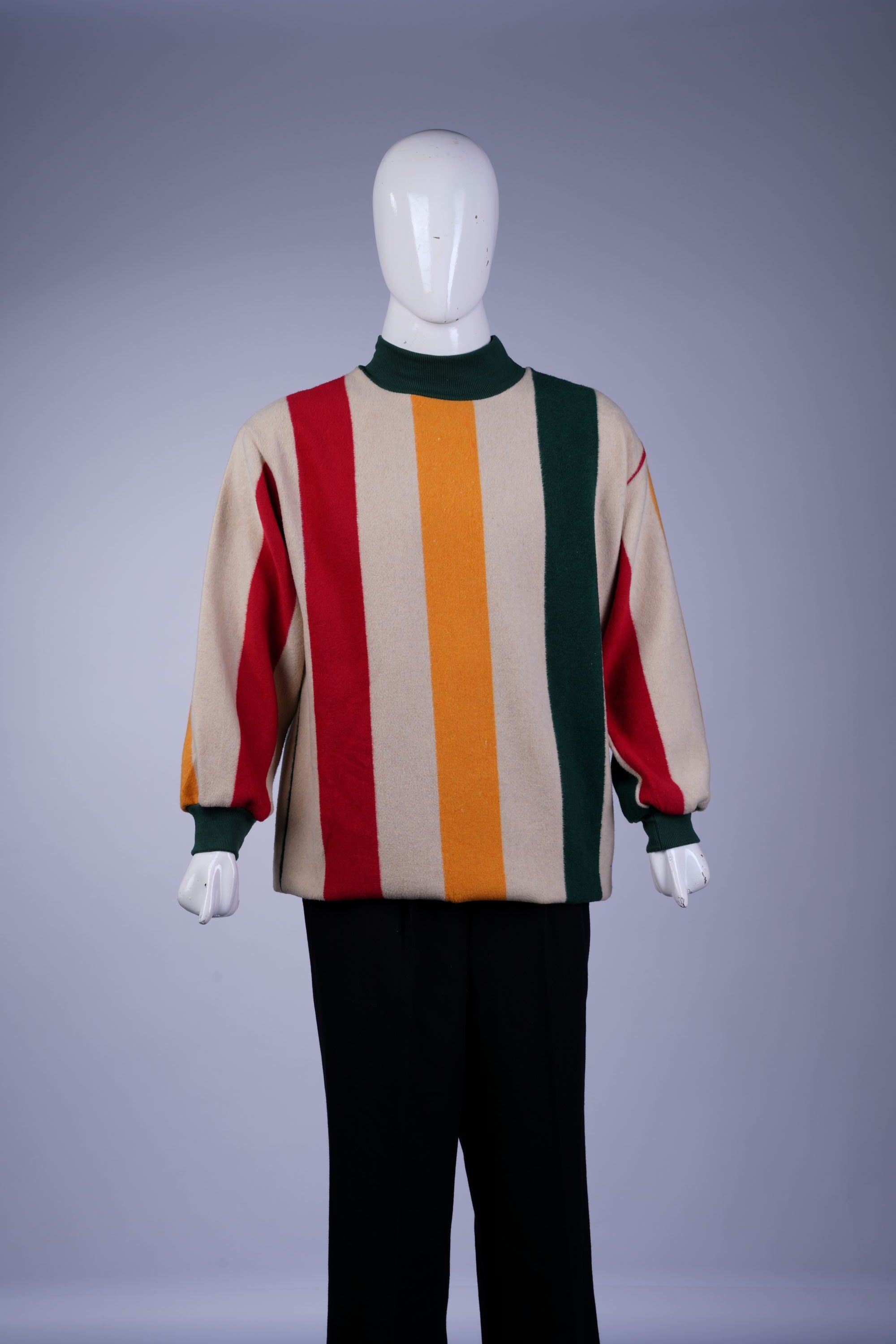 Vibrant vintage sweater featuring vertical stripes in multiple colors, mock neck, and expressive streetwear style.