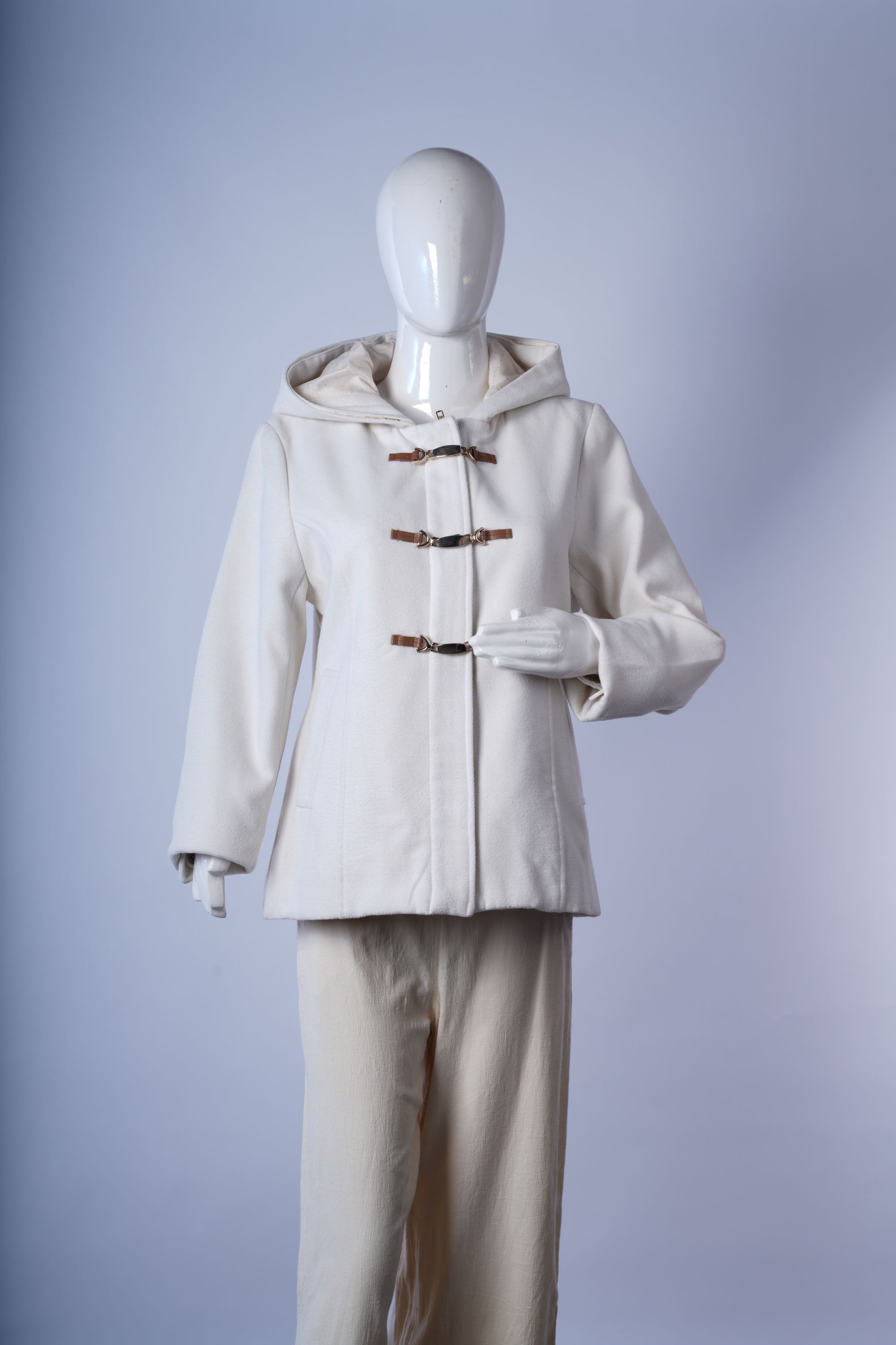 women's ivory overcoat featuring clean lines, longline silhouette, and timeless design.