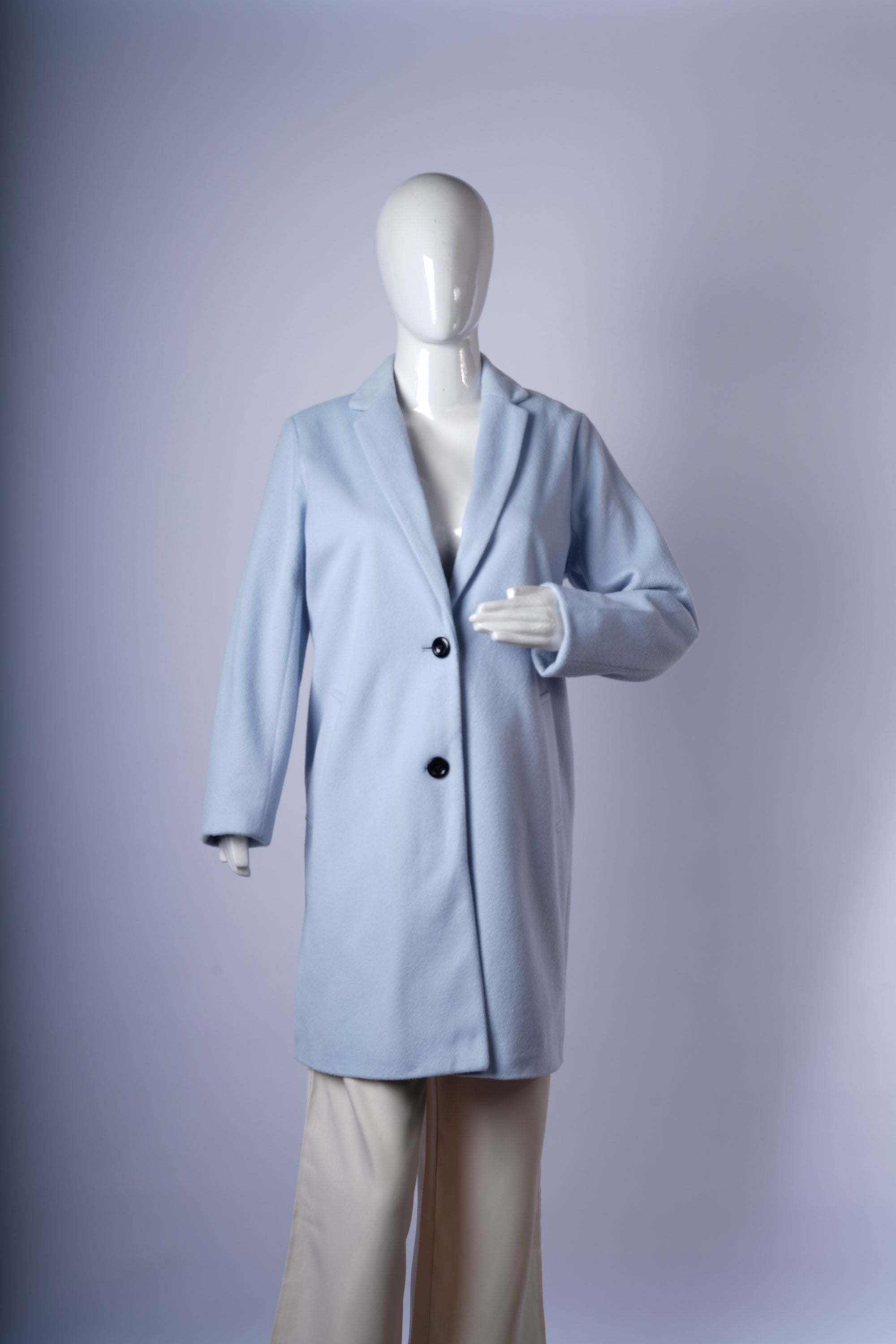 Elegant light blue wool-blend coat for women, featuring single-breasted design, notched lapels, and mid-thigh silhouette.