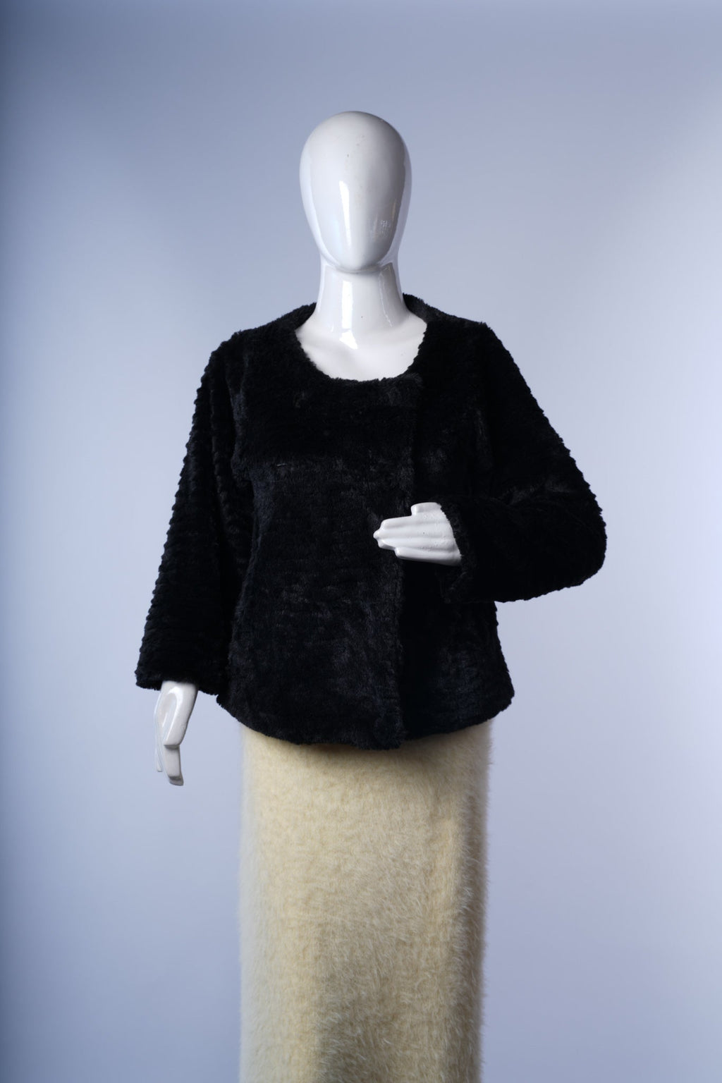 women's charcoal long coat featuring clean lines and versatile winter layering design.