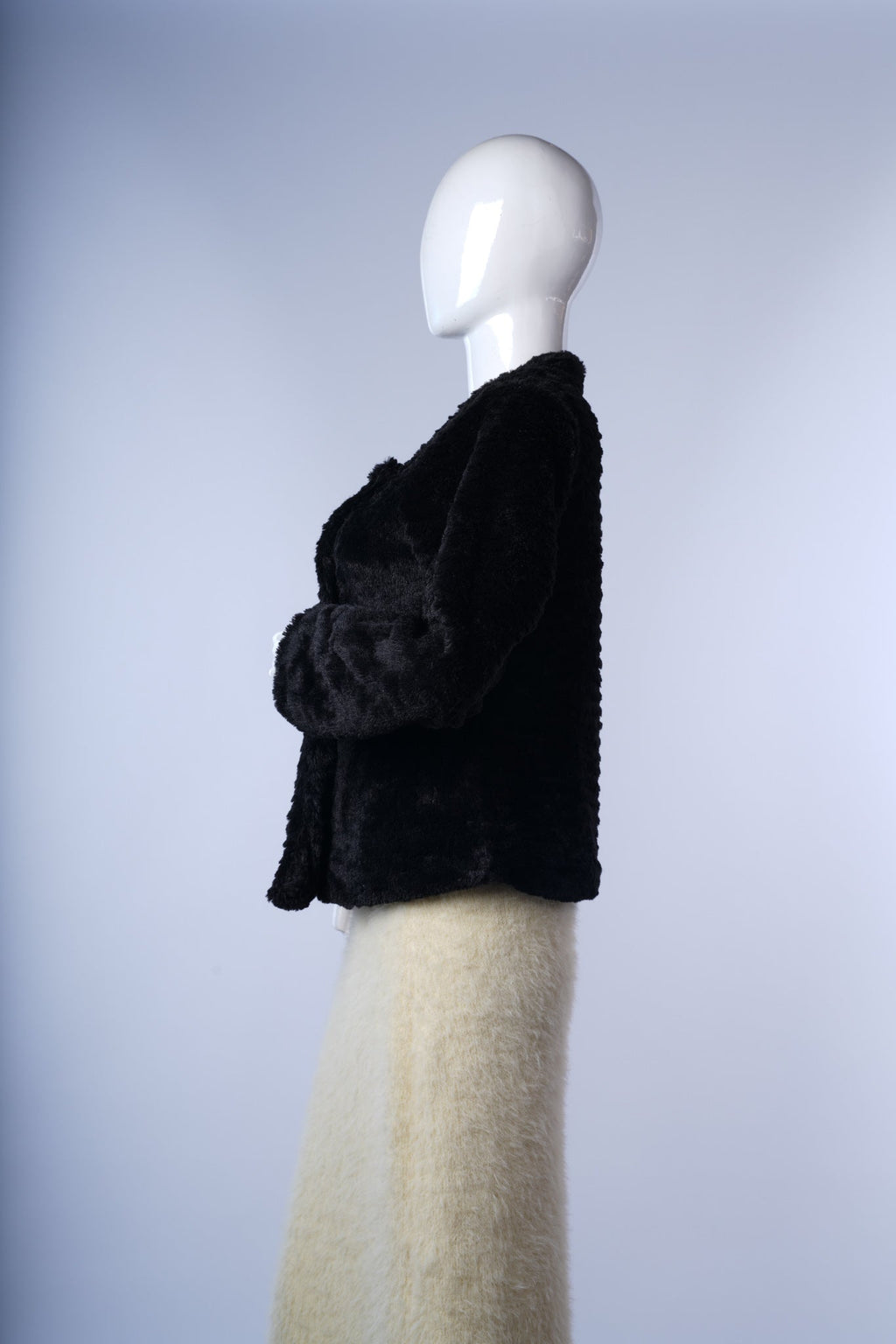 Elegant wool-blend coat with waist tie and wide lapels, ideal for refined winter outfits.