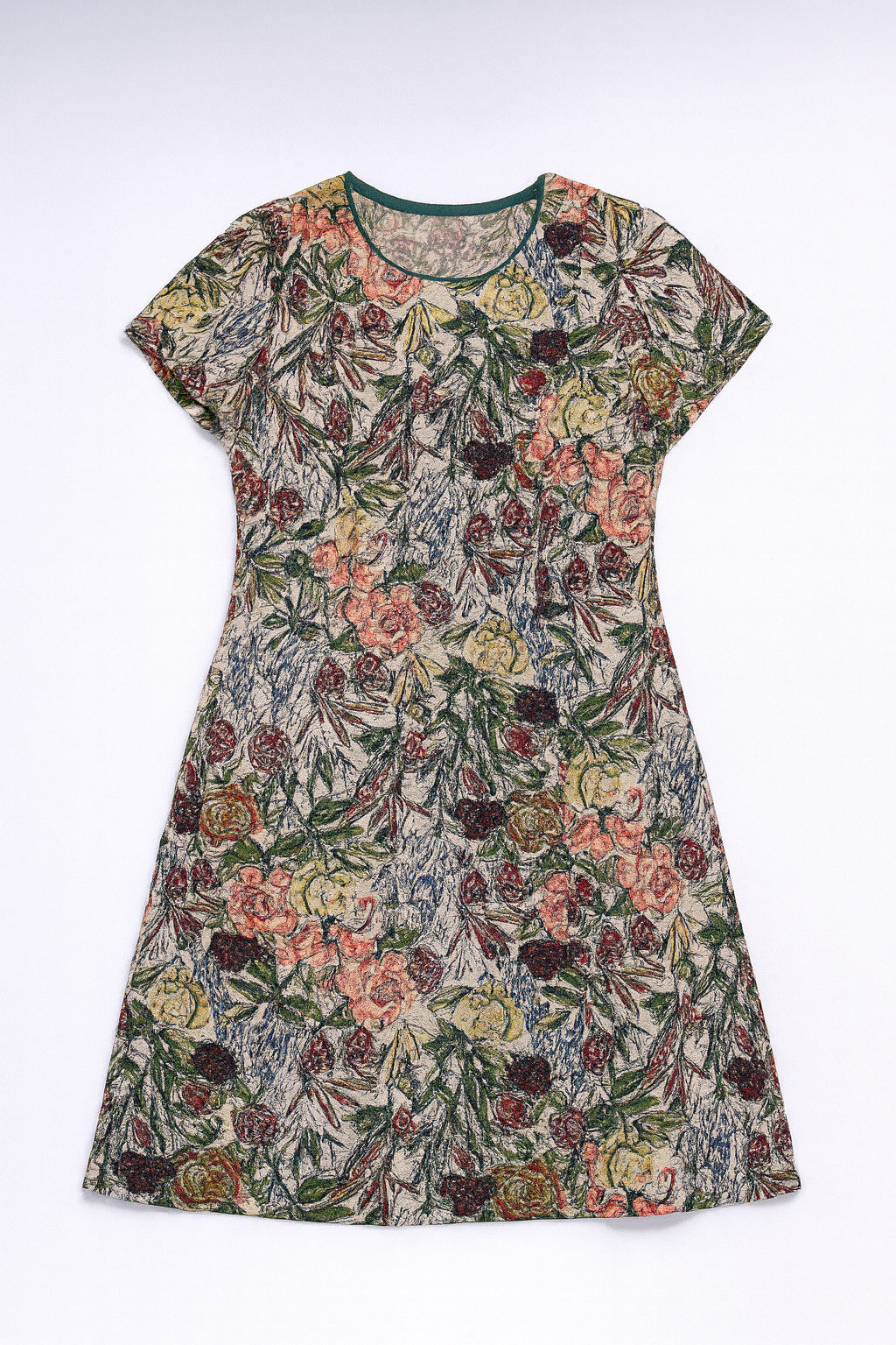 Light cream knee-length dress with vibrant floral print, perfect for casual and warm-weather outings.