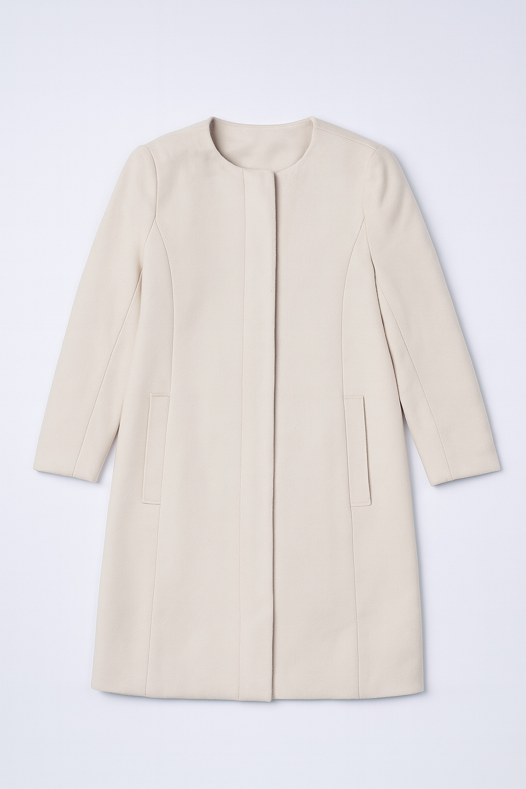 Off-white longline jacket with collarless design, gold-toned zipper, and front pockets.