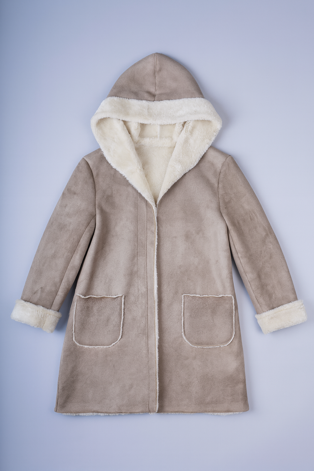 Beige faux mouton jacket with suede-like exterior, cozy faux fur lining, hood, and zip closure.