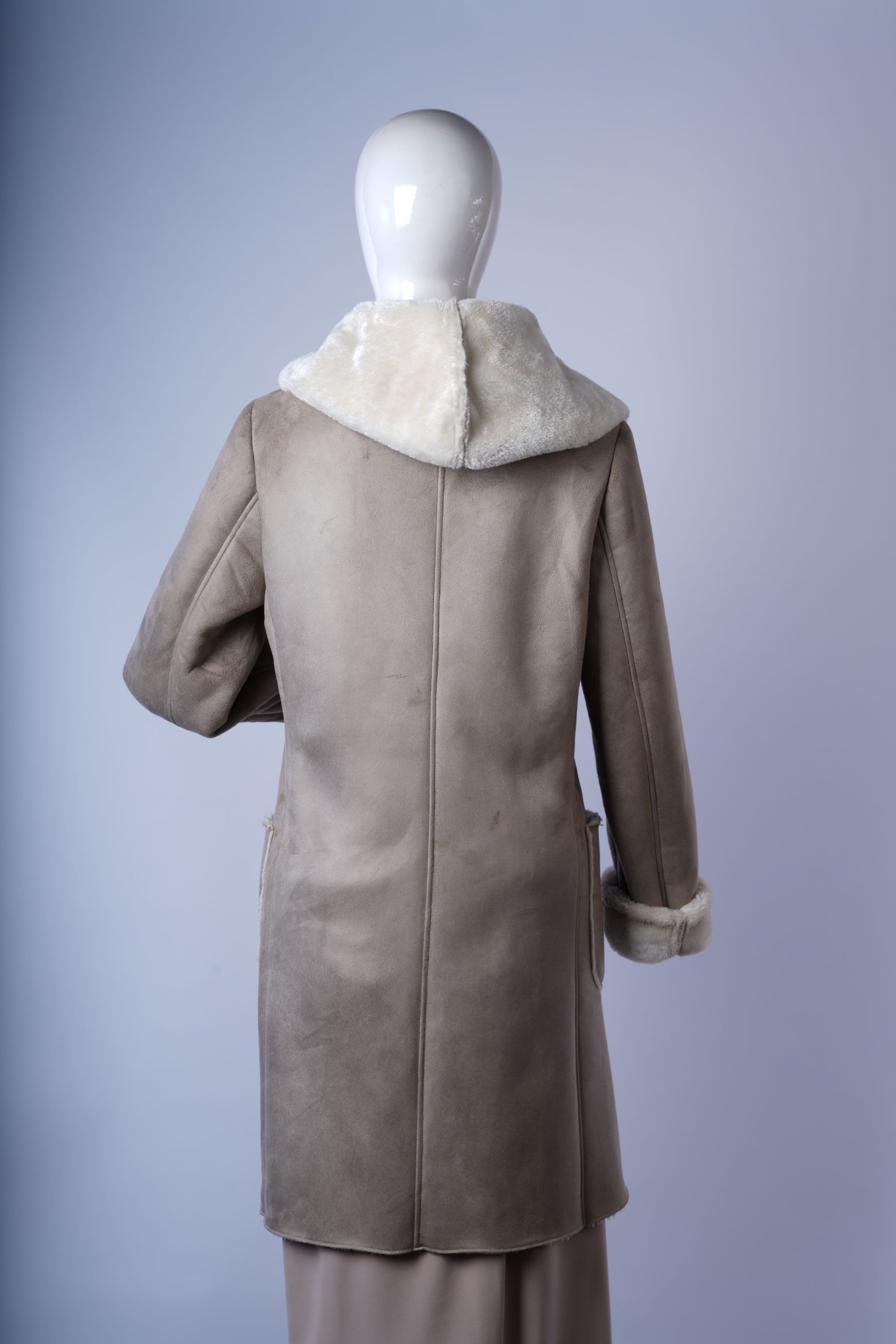 Cozy beige jacket with suede-like shell and plush faux fur interior for winter wear.
