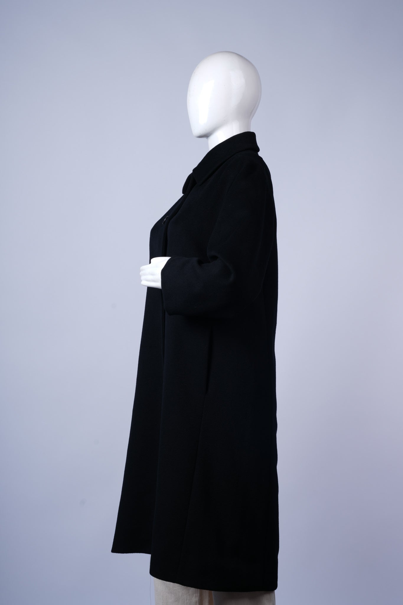 Close-up of premium wool texture and lapel details on Chester coat