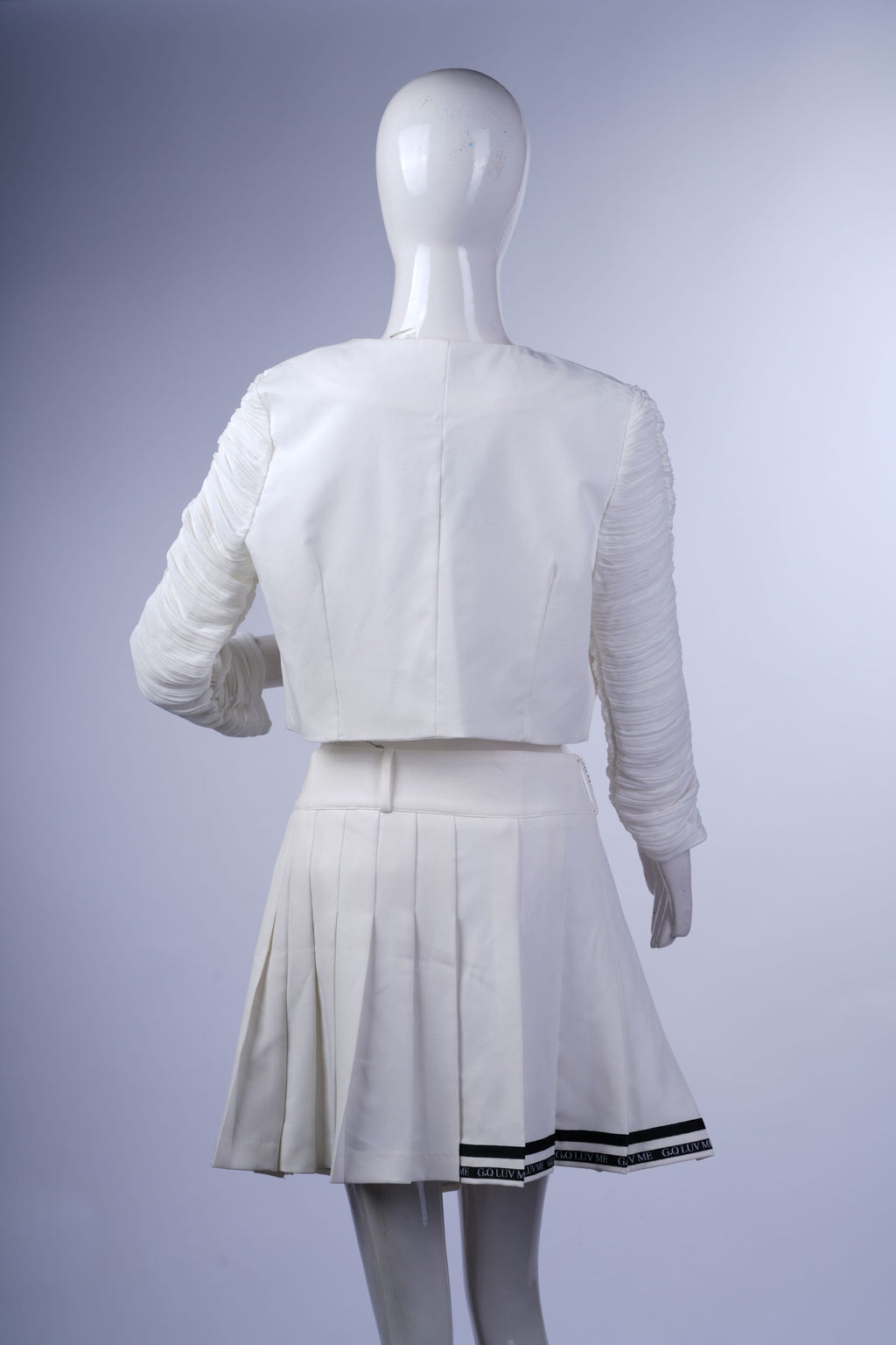 Chic white cropped jacket for women, ideal for elegant layered outfits