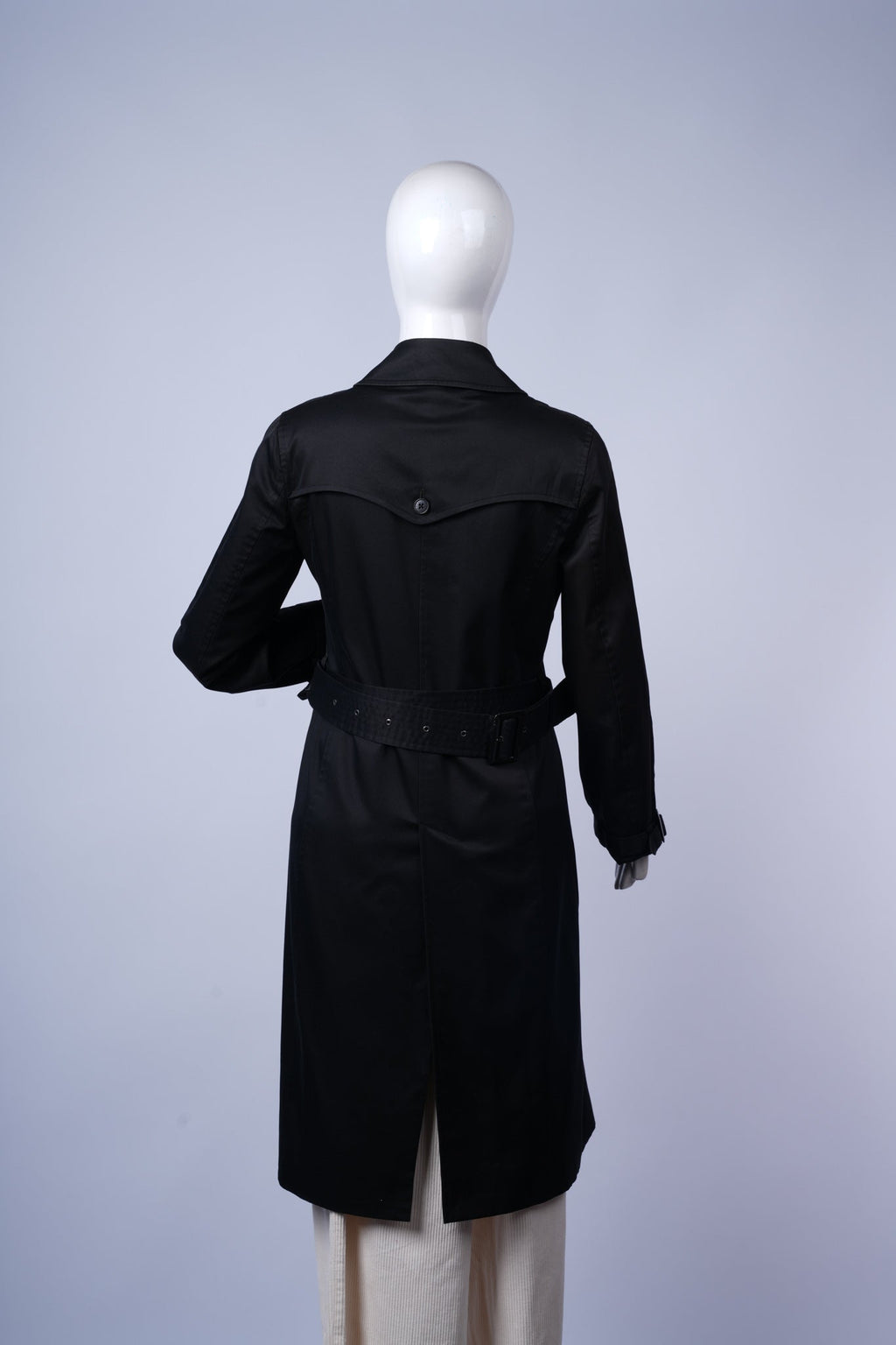 Elegant black trench coat ideal for formal or smart-casual outerwear.