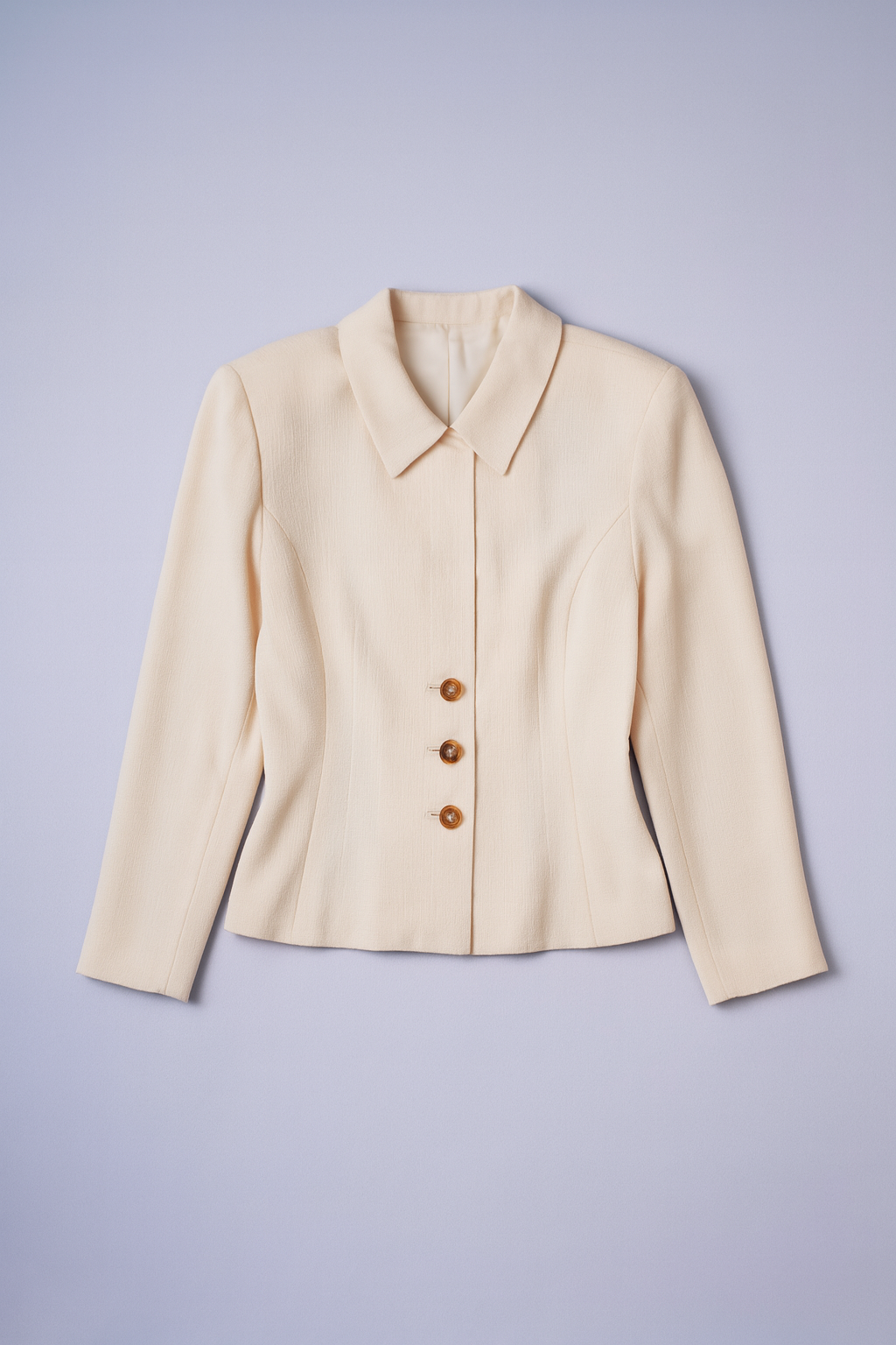 Beige blazer with notched lapels, button-front closure, and flap pockets for women.