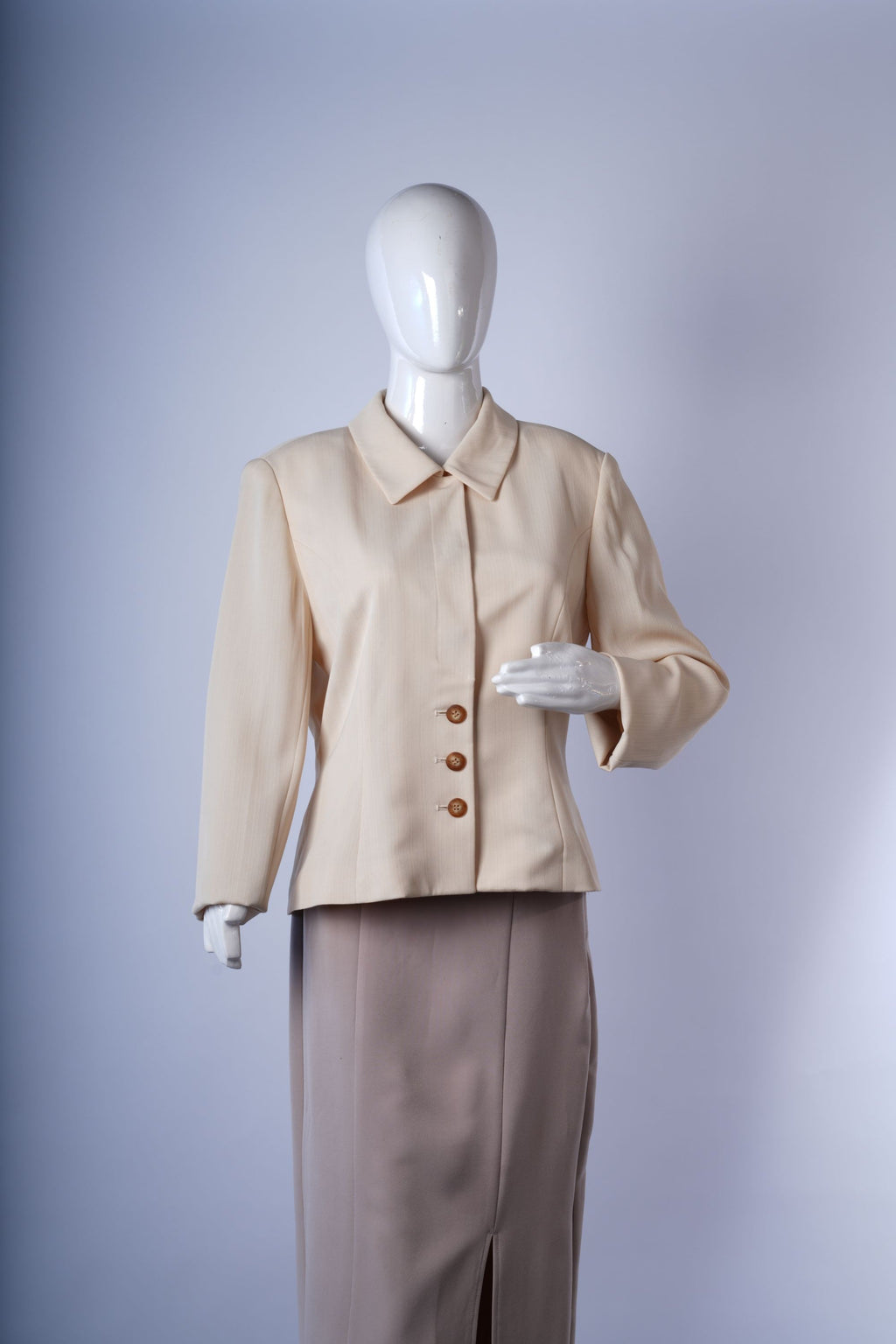 women's structured beige blazer ideal for formal or smart-casual occasions.