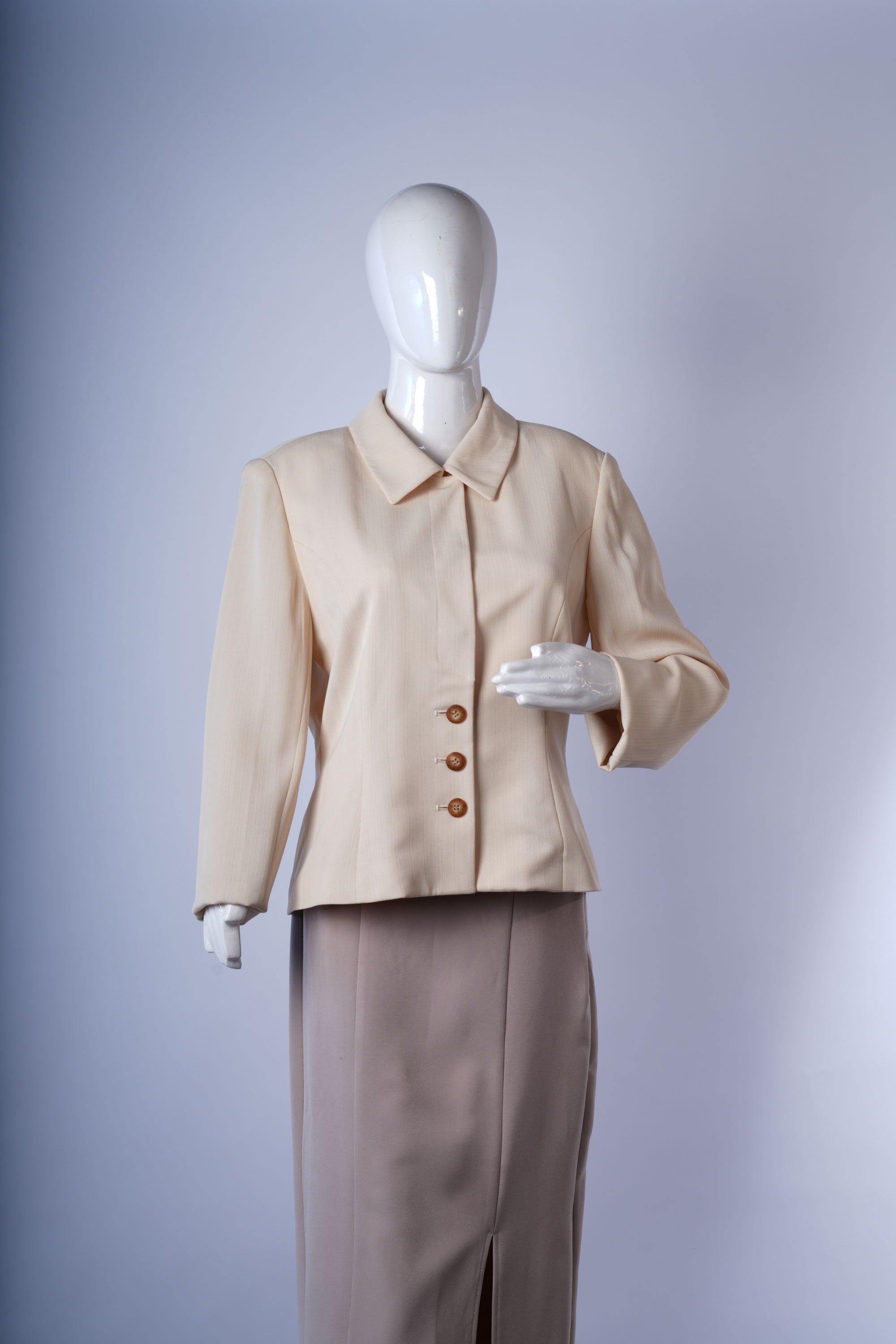 women's structured beige blazer ideal for formal or smart-casual occasions.