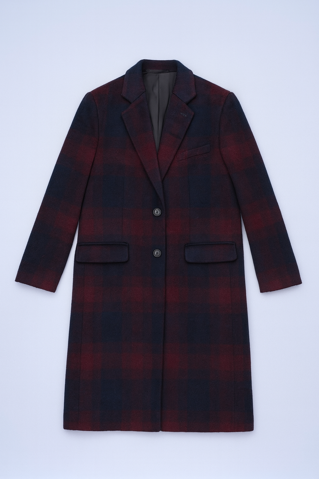 Single-breasted overcoat with bold plaid pattern, notched lapels, and button-front closure.