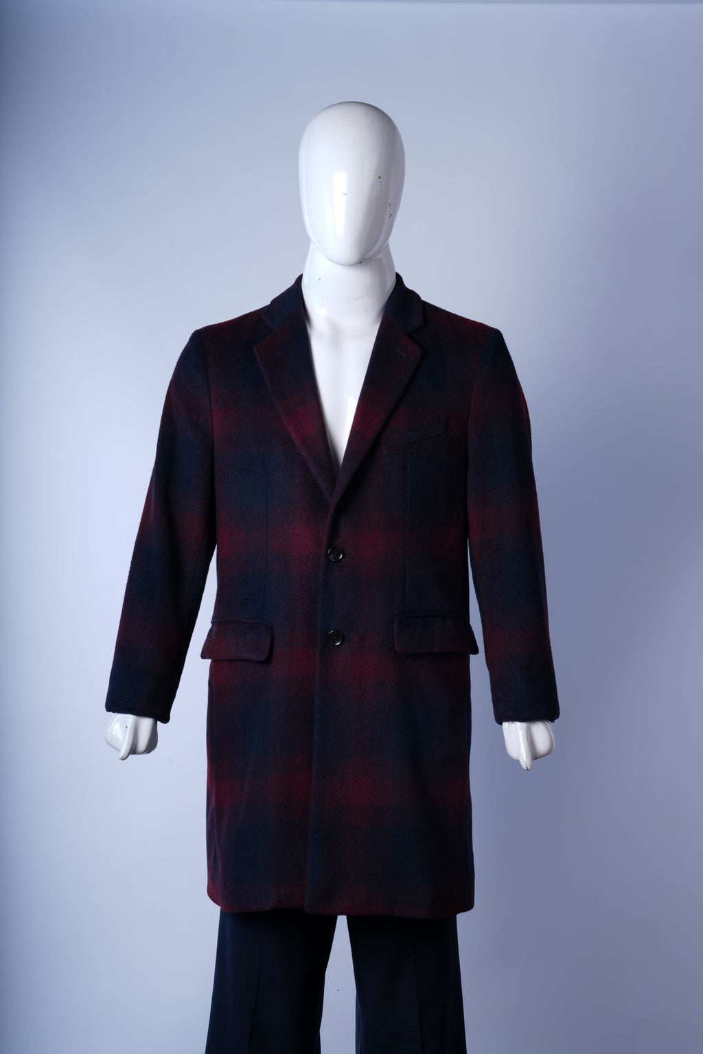 women's wool-blend plaid overcoat ideal for warmth and versatile styling.