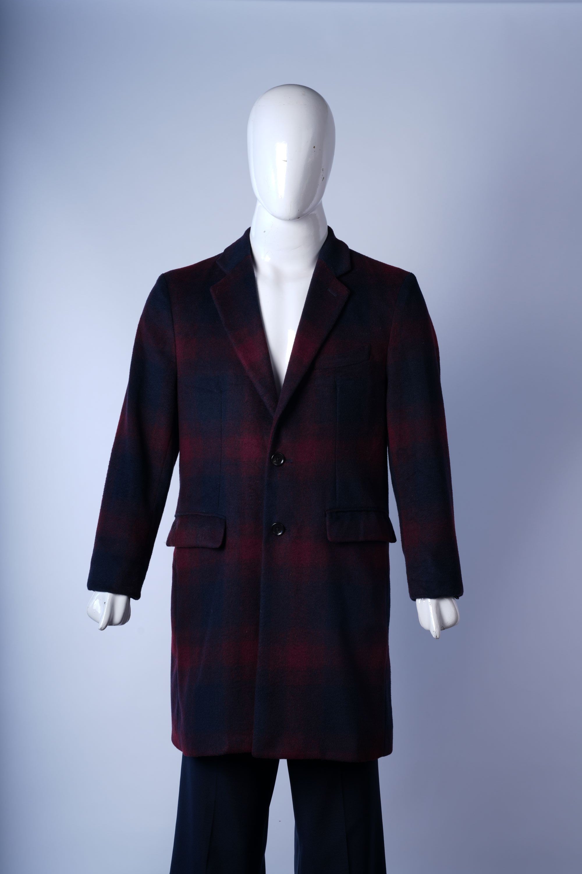 women's wool-blend plaid overcoat ideal for warmth and versatile styling.