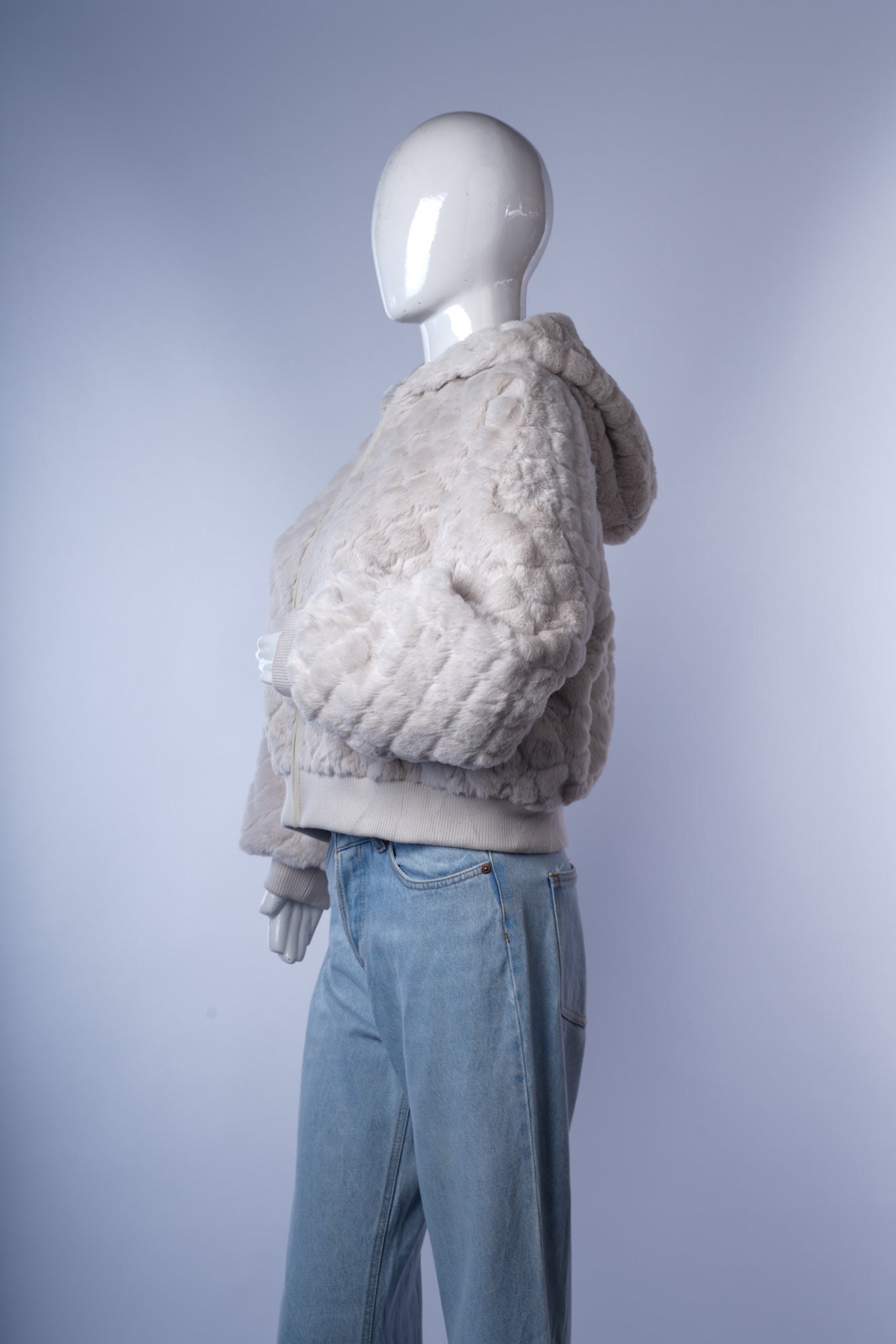 Stylish teddy fleece hoodie featuring zip closure and comfortable fit.