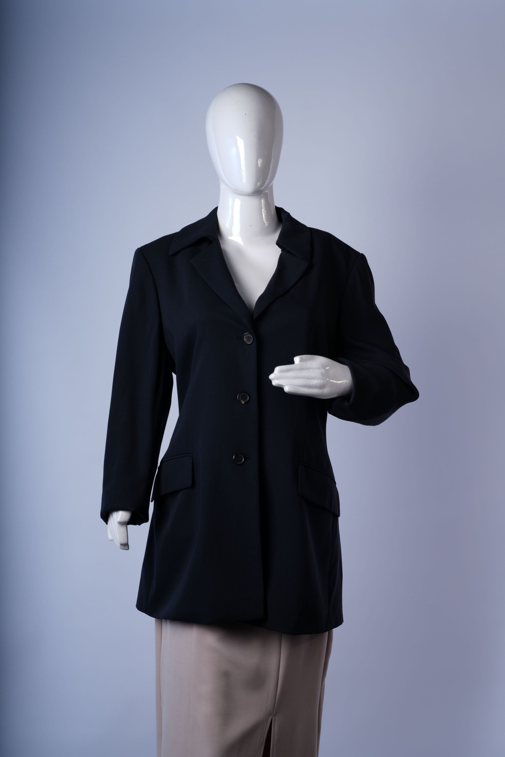 women's polished black coat ideal for formal or office wear.