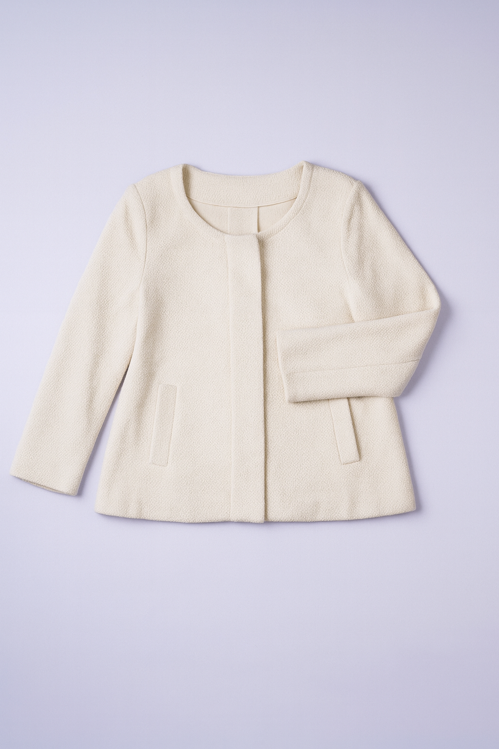 Classic black three-button coat ideal for professional or business wear.