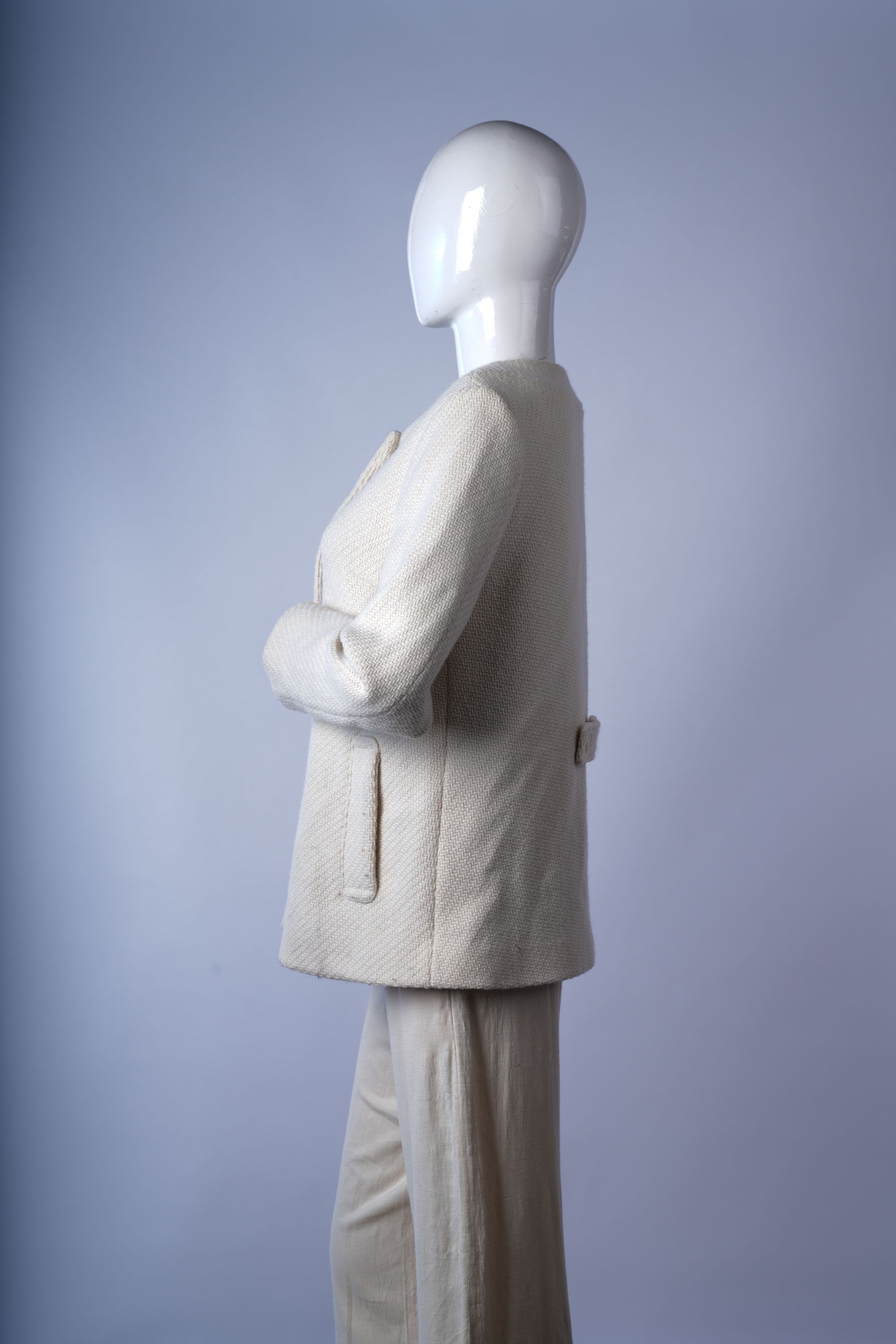 Elegant black coat featuring structured fit, perfect for work or business settings.