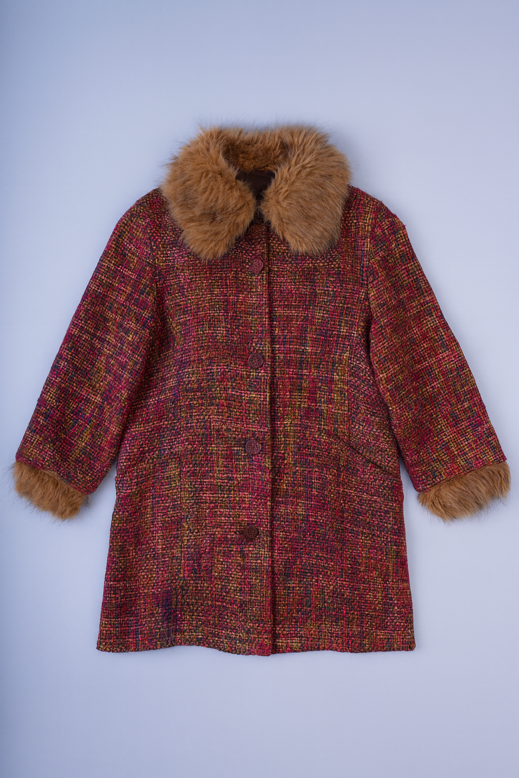 women's FFM tweed winter coat with multicolor woven design and faux fur trim.