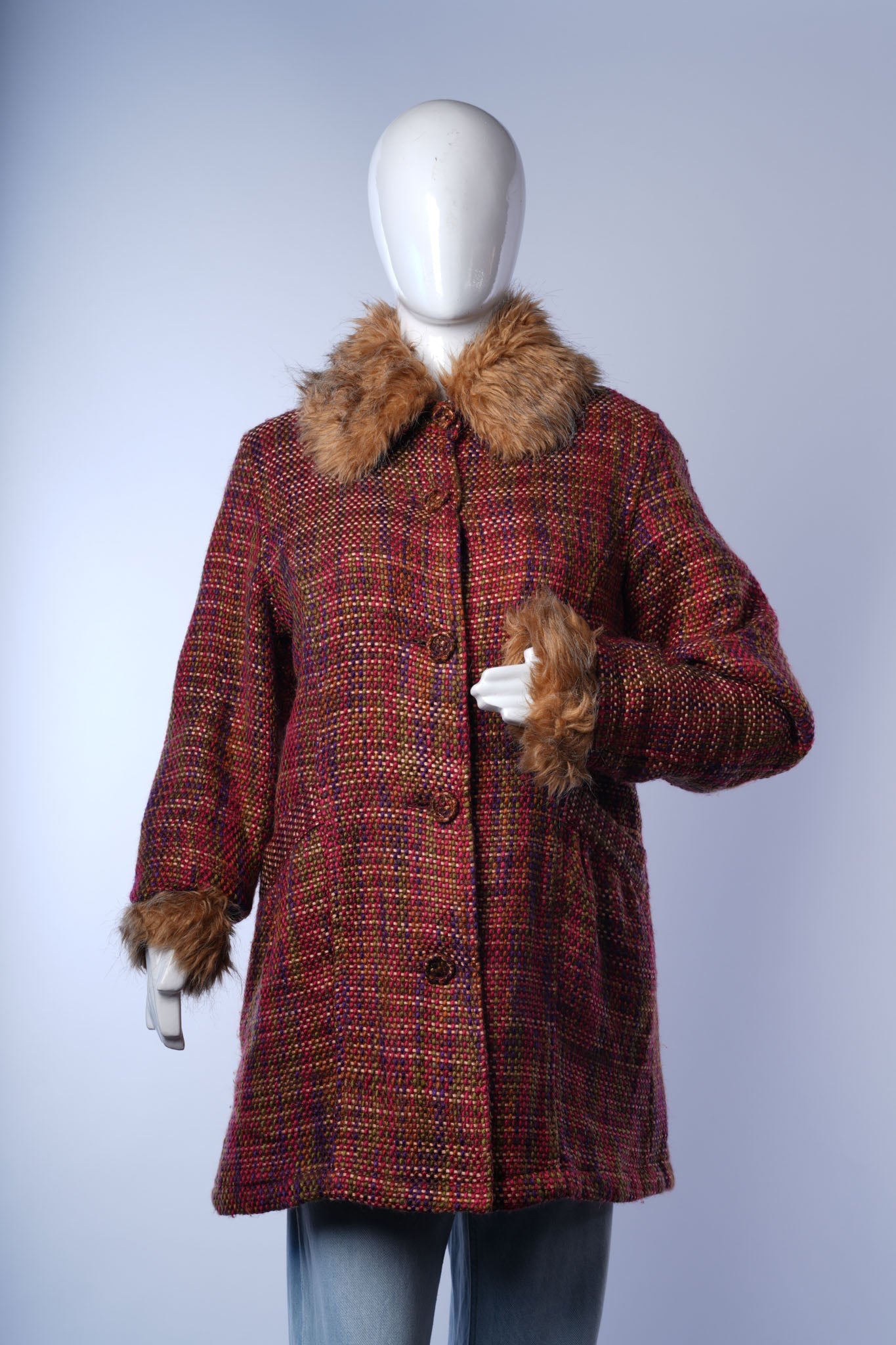 Stylish multicolor tweed coat for women featuring cozy faux fur accents.