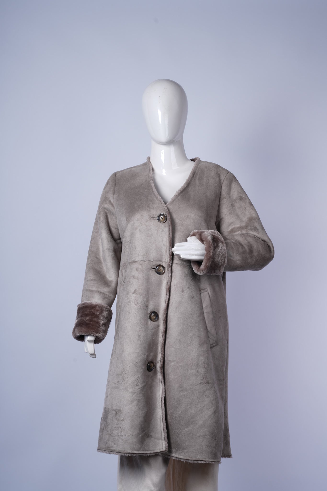 women's cozy jacket featuring soft fur interior and stylish sueded outer fabric.