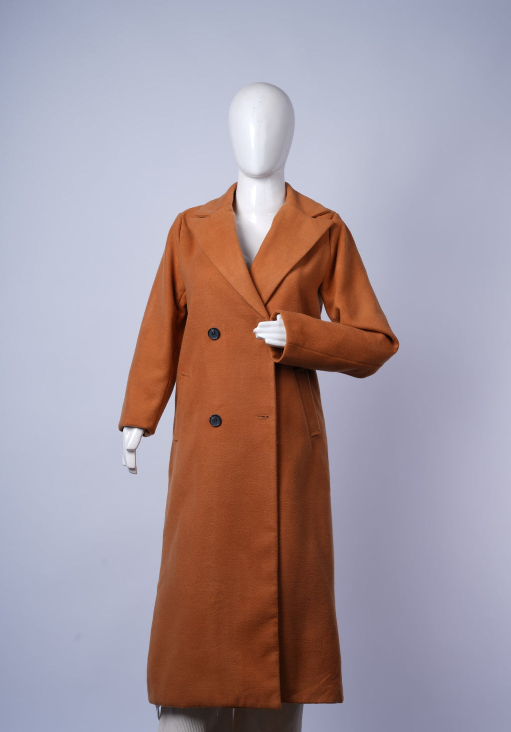women's camel coat featuring timeless design and cozy winter warmth.