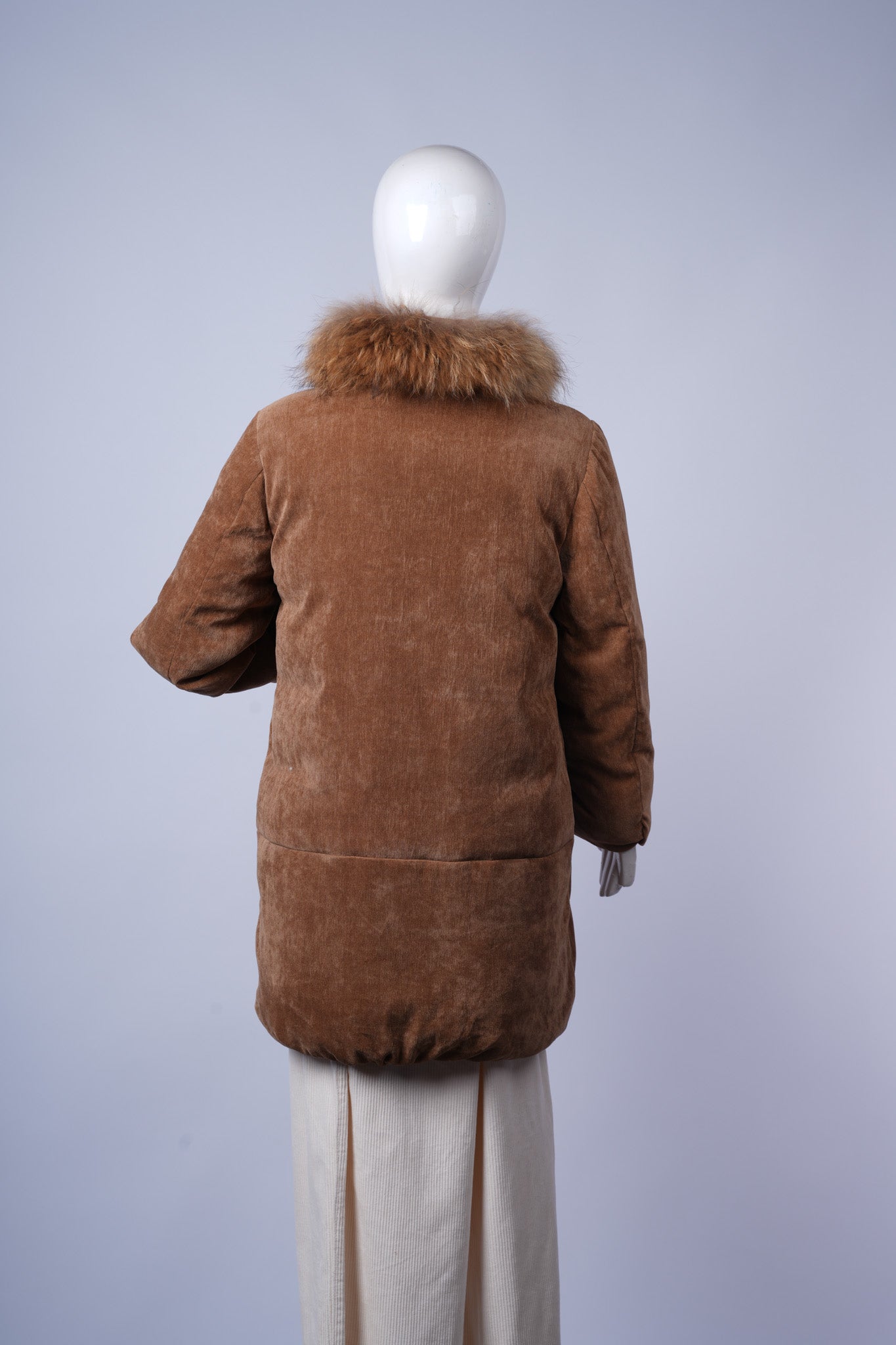 Classic quilted brown jacket perfect for cold-weather layering and casual wear.