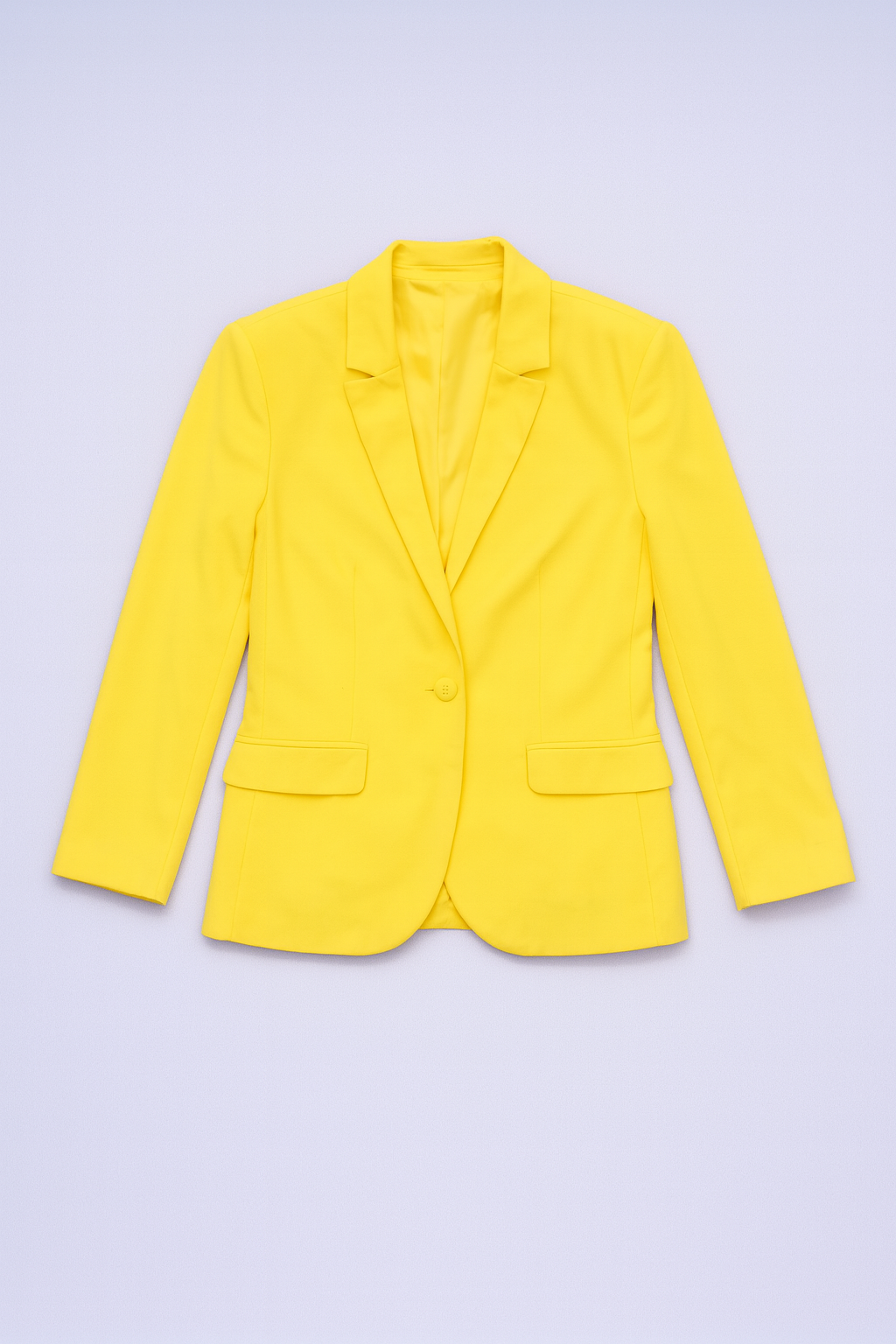 Bright yellow blazer with notched lapels and one-button closure.