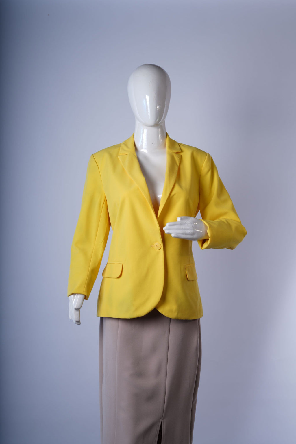 women's fitted yellow blazer ideal for playful or casual chic styling.
