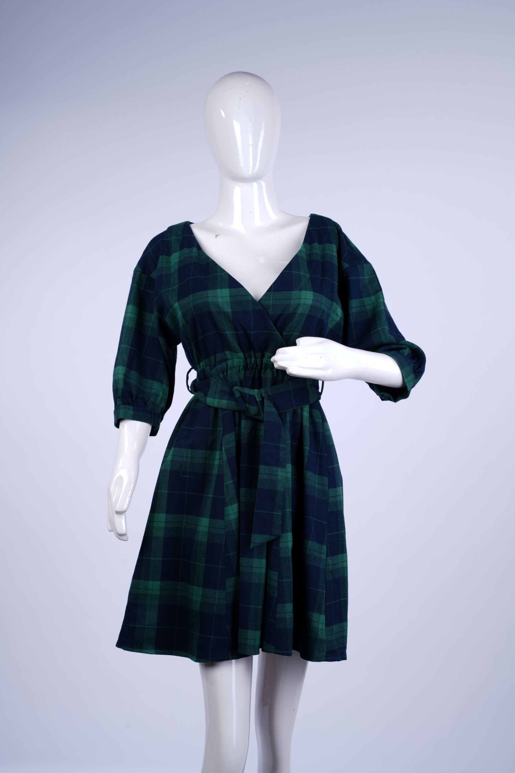 women's plaid A-line dress featuring flattering silhouette and stylish waist tie.