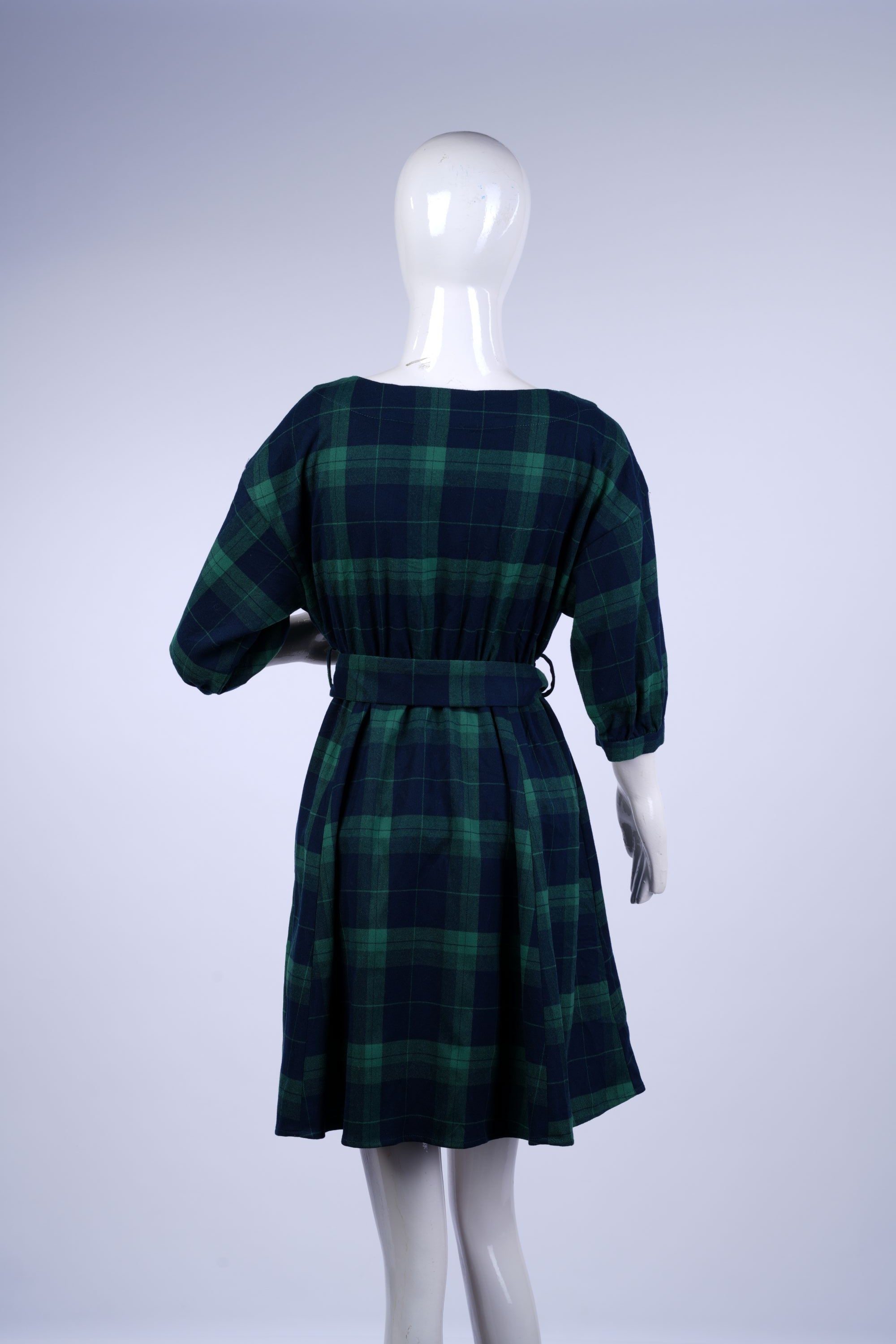 Flattering A-line plaid dress perfect for casual outings or daytime events.