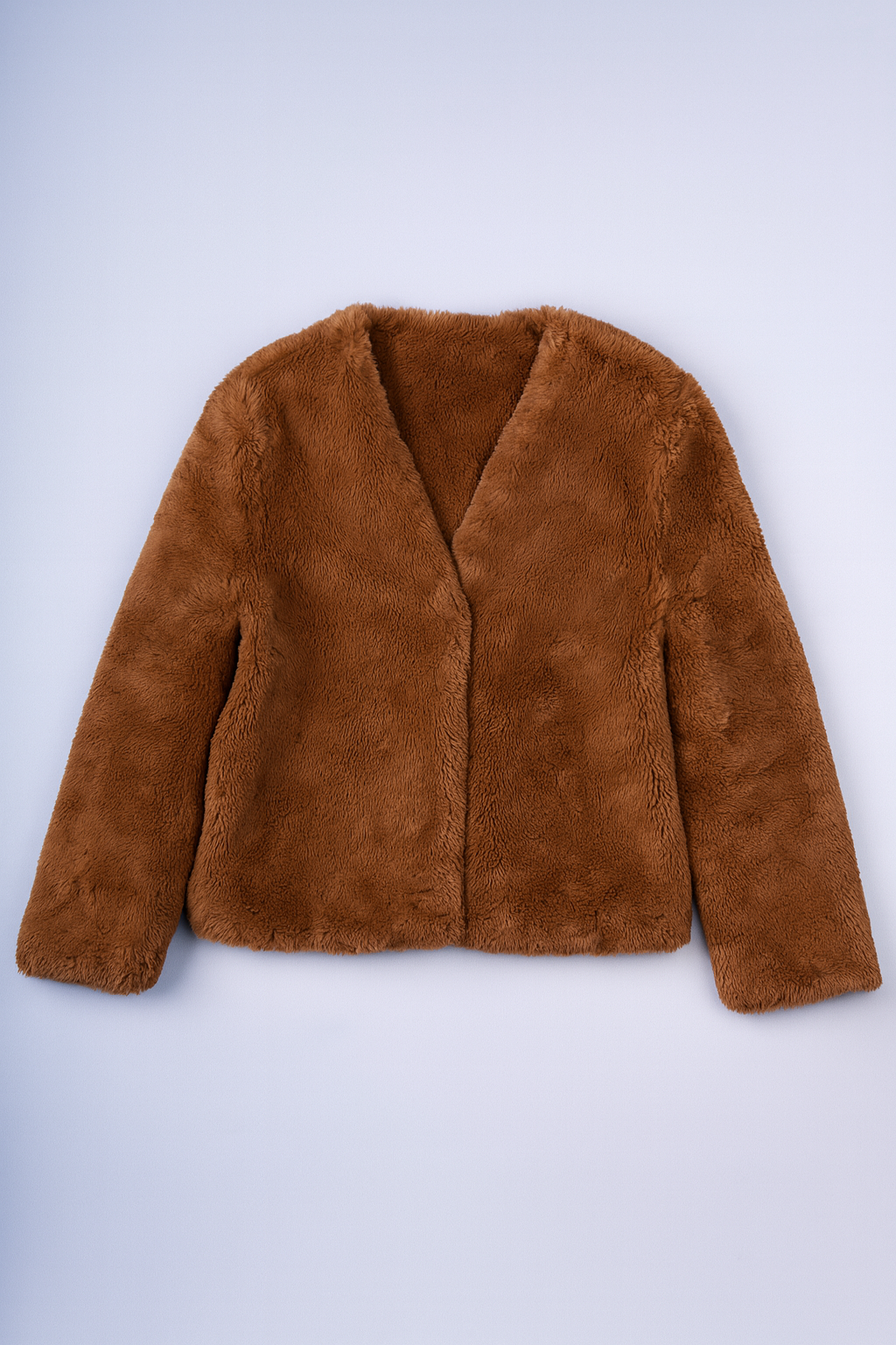 women's cropped fluffy faux fur jacket in warm camel for cozy winter style.