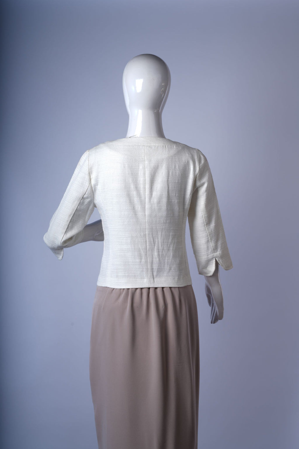 White tweed jacket perfect for formal or dressy casual styling.